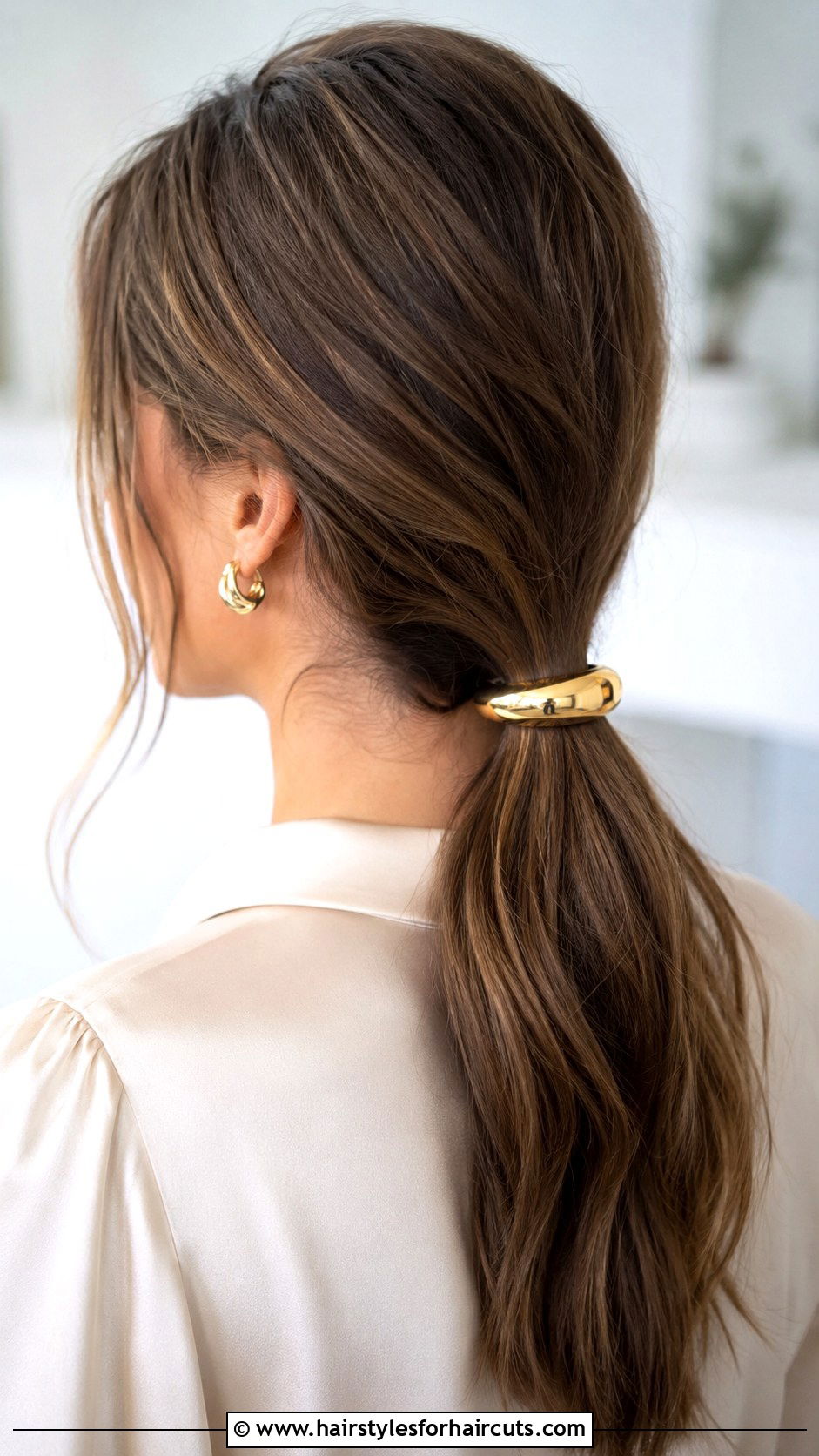 Accessorized Low Ponytail - 25 work hairstyles for medium hair - 25 work hairstyles for medium hair