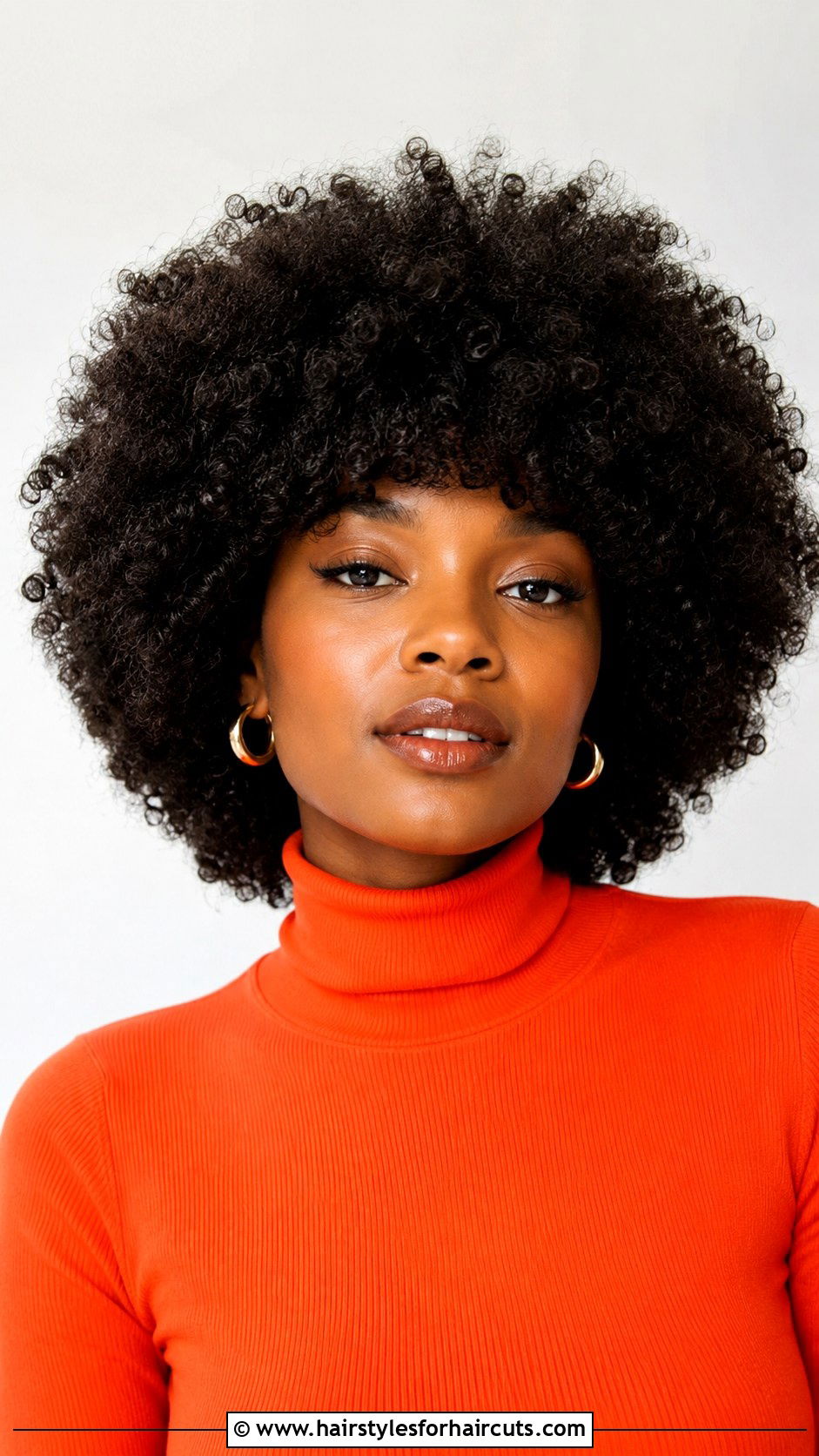 Afro With Rounded Bangs - 25 bang haircuts for curly hair - 25 bang haircuts for curly hair