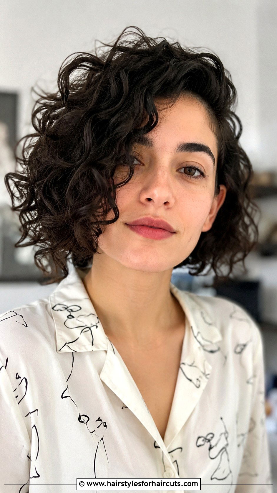 Asymmetrical Curly Bob - 25 girls hairstyles for curly hair - 25 girls hairstyles for curly hair
