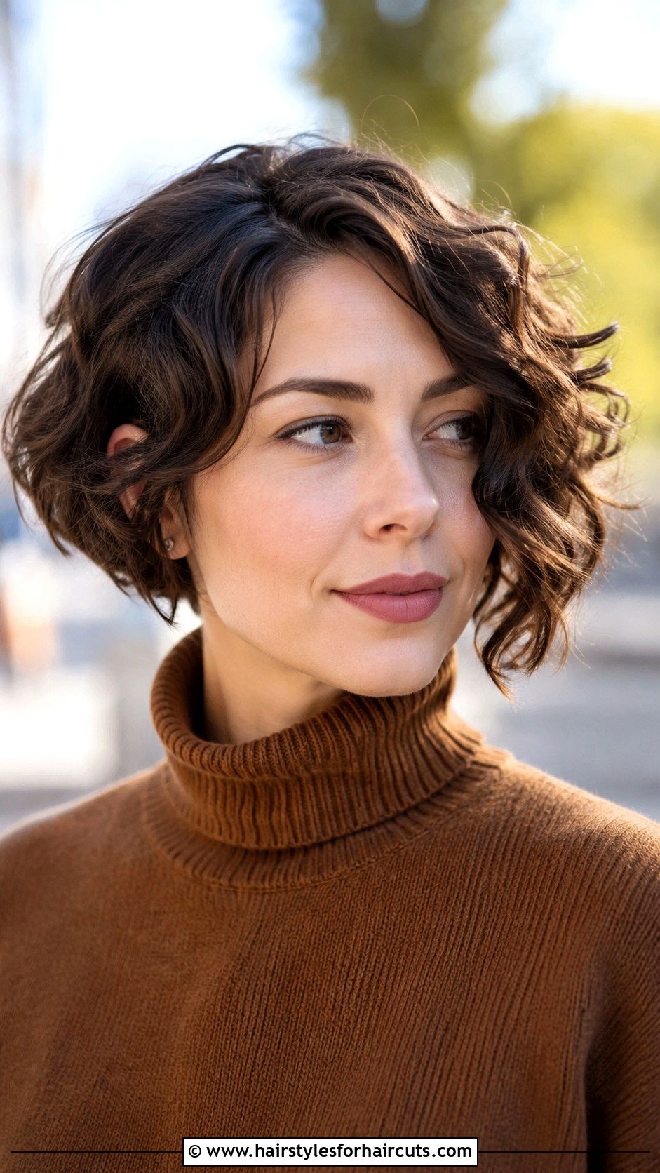 Asymmetrical Curly Bob Haircut - 25 haircuts for afro curly hair - 25 haircuts for afro curly hair