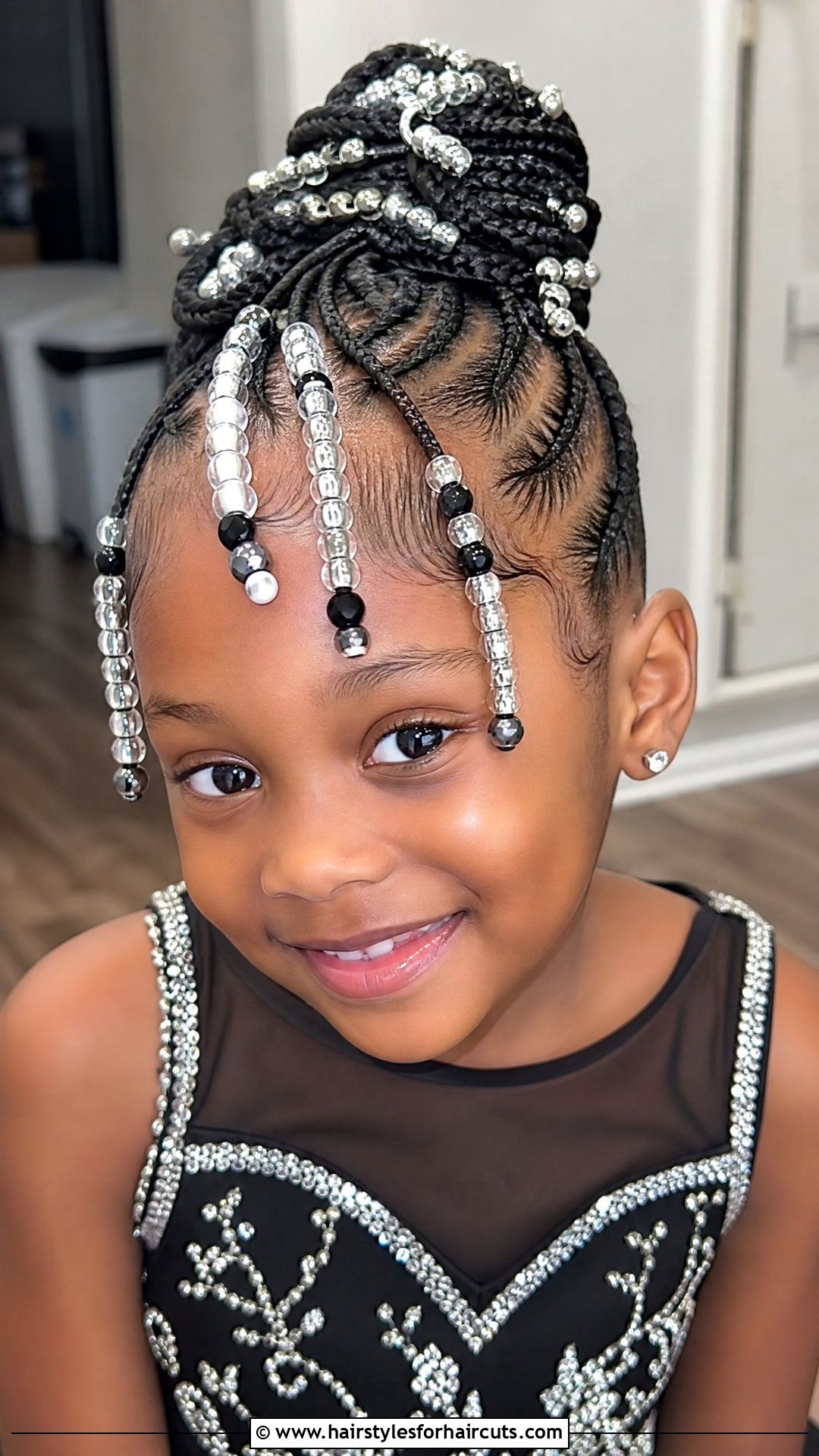 Beaded Cornrows Updo - 25 little black girl hairstyles - 25 little black girl hairstyles