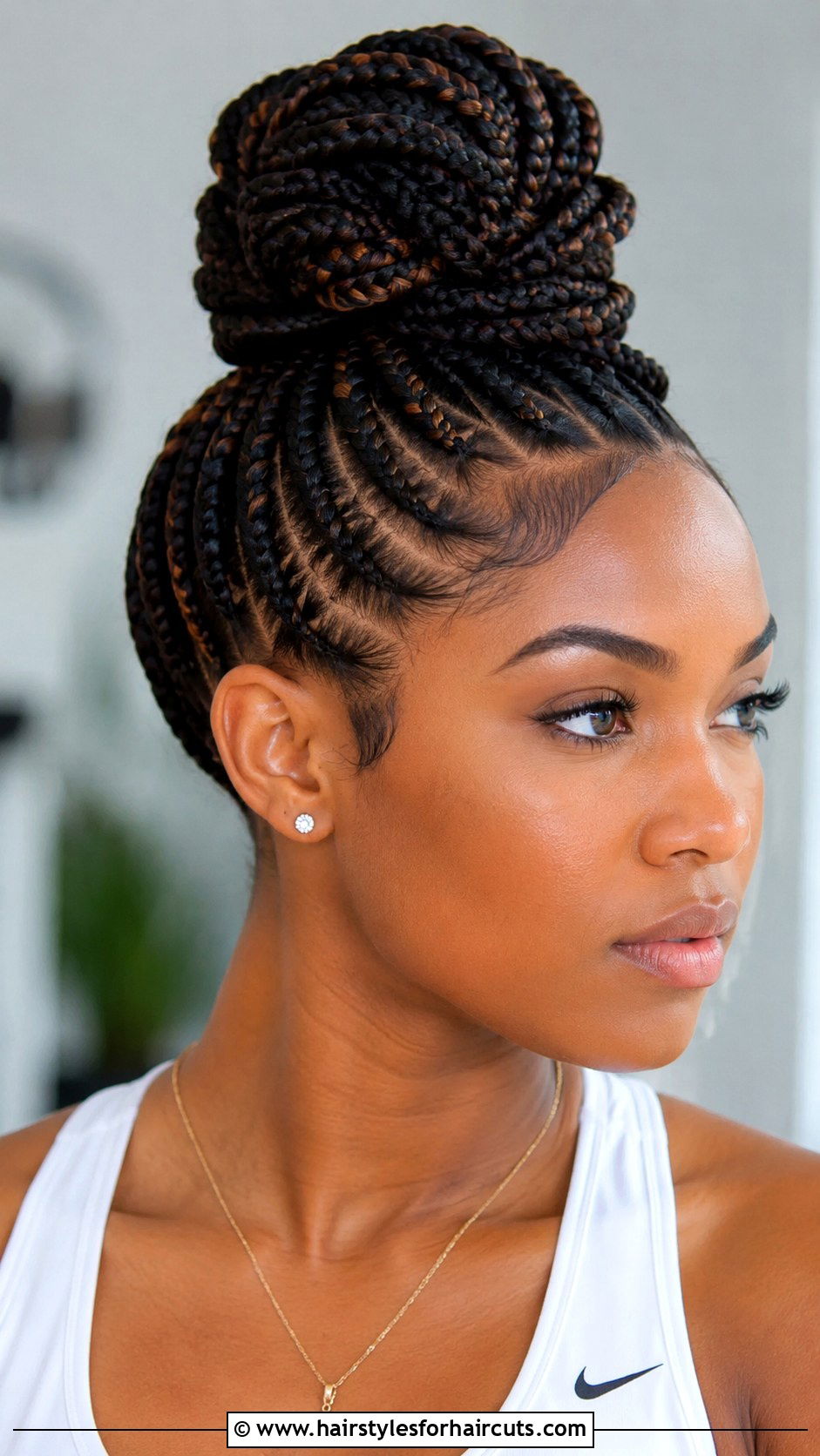 Braided Top Knot - 25 gym hairstyles for thin hair - 25 gym hairstyles for thin hair