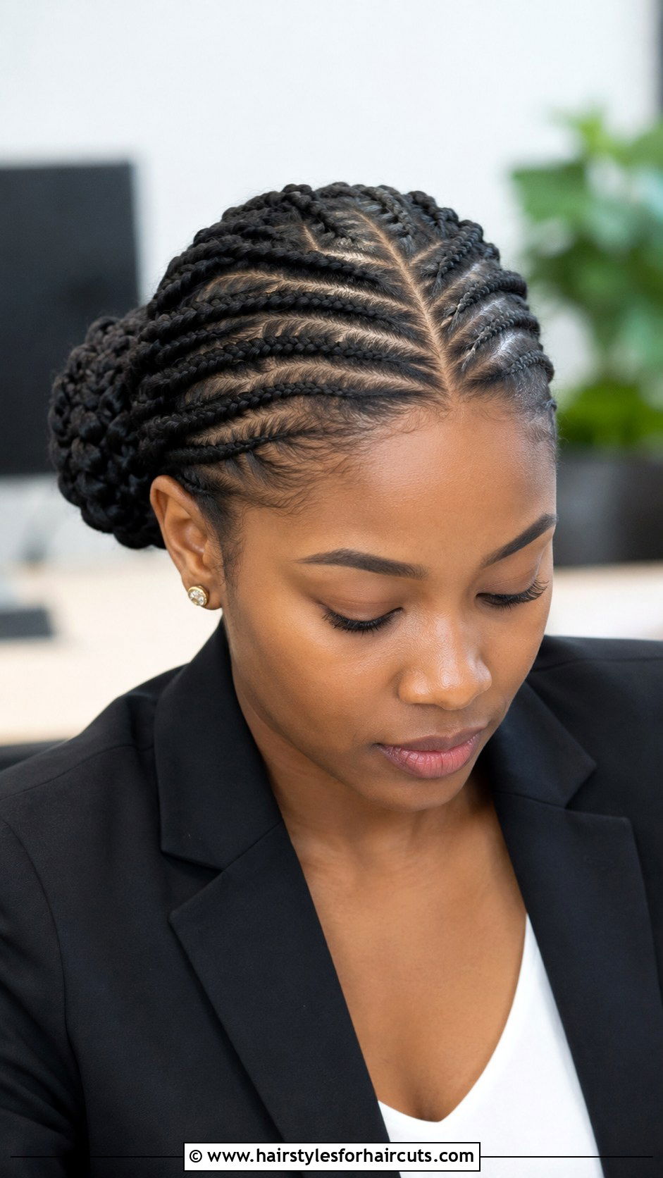 Center Part Braided Bun - 25 cute bun hairstyles for black hair - 25 cute bun hairstyles for black hair