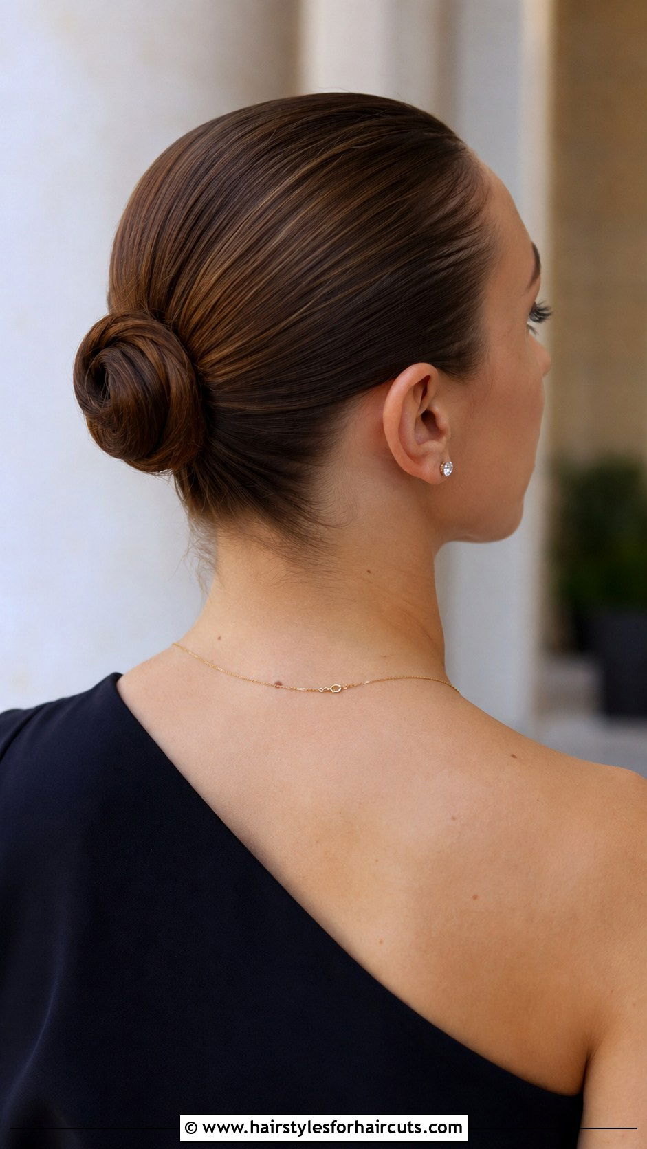 Classic Low Ballet Bun - 25 low bun hairstyles for long hair - 25 low bun hairstyles for long hair
