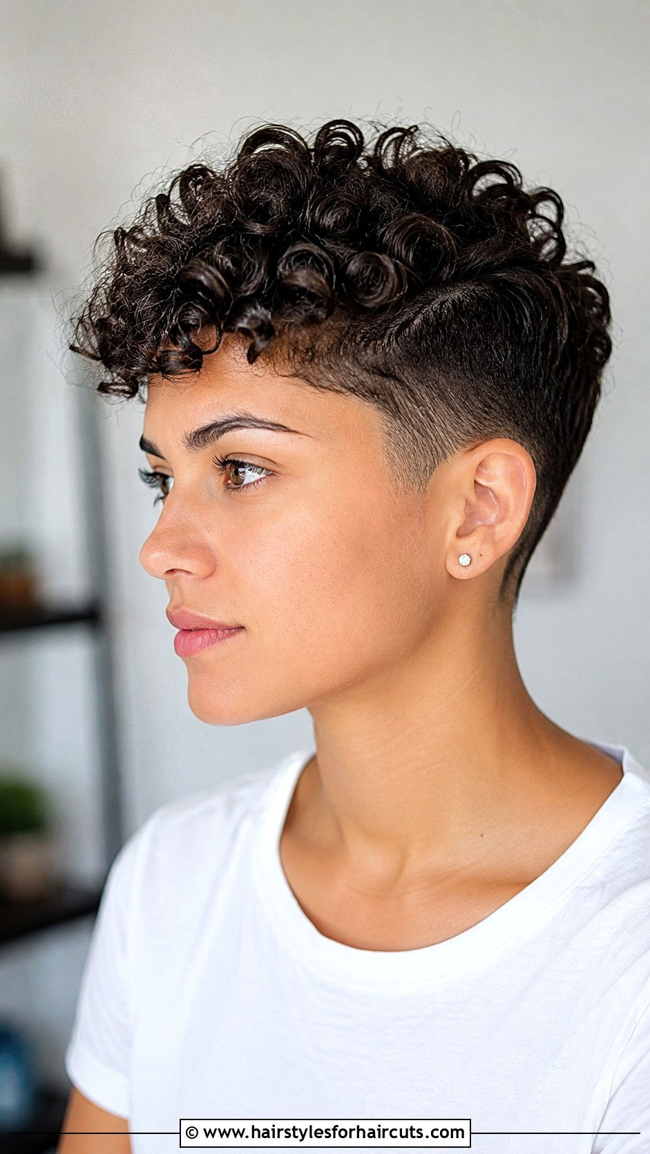 Curly Pixie Cut With Shaved Sides - 25 tomboy haircuts for curly hair - 25 tomboy haircuts for curly hair