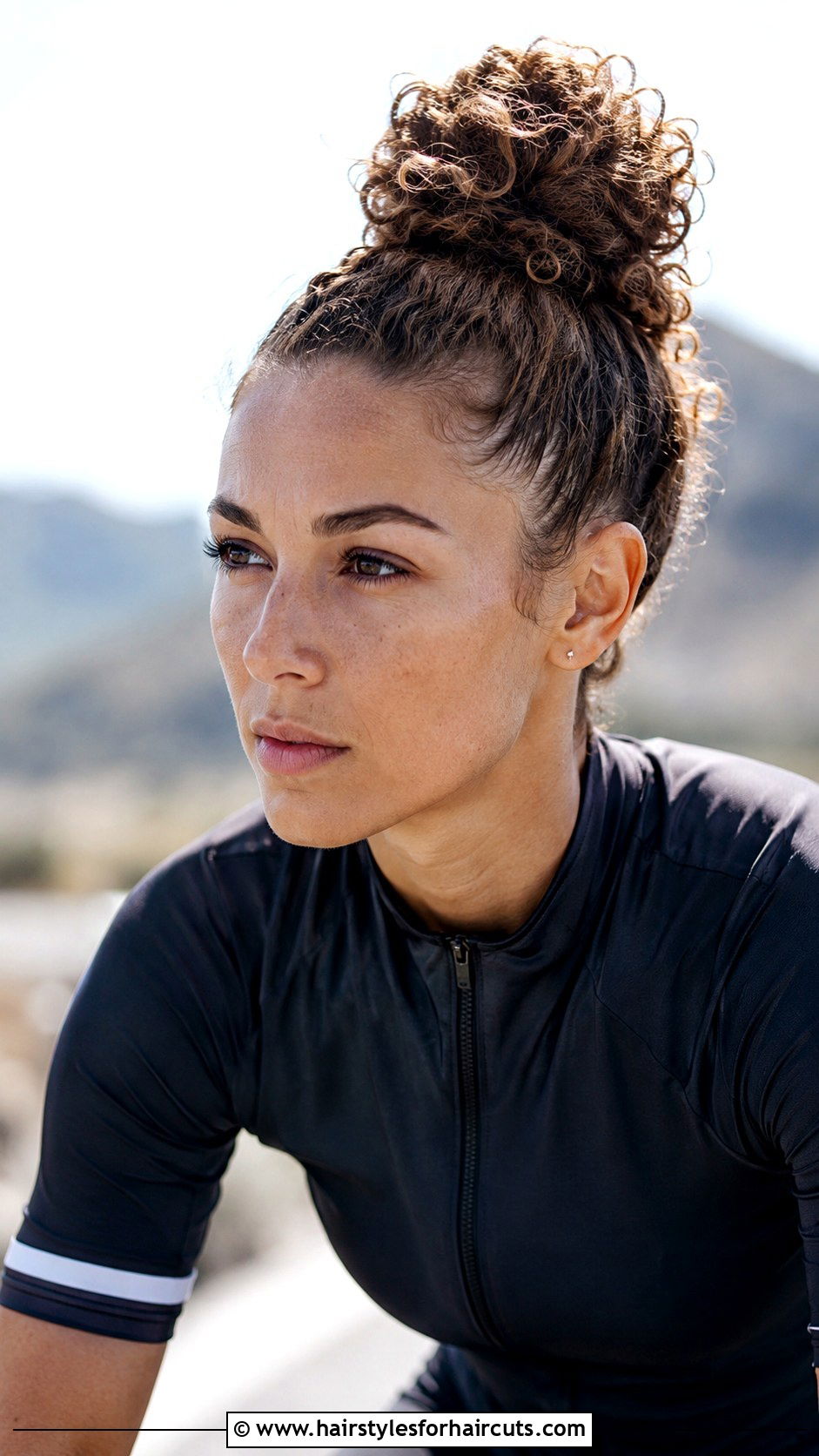 Curly Top Knot - 25 cute sporty hairstyles for curly hair - 25 cute sporty hairstyles for curly hair