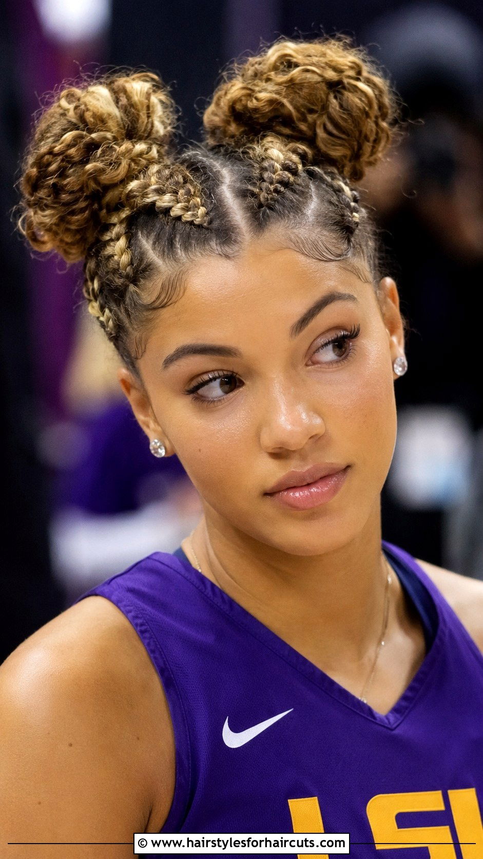 Double Curly Space Buns With Braids - 25 softball hairstyles for curly hair - 25 softball hairstyles for curly hair
