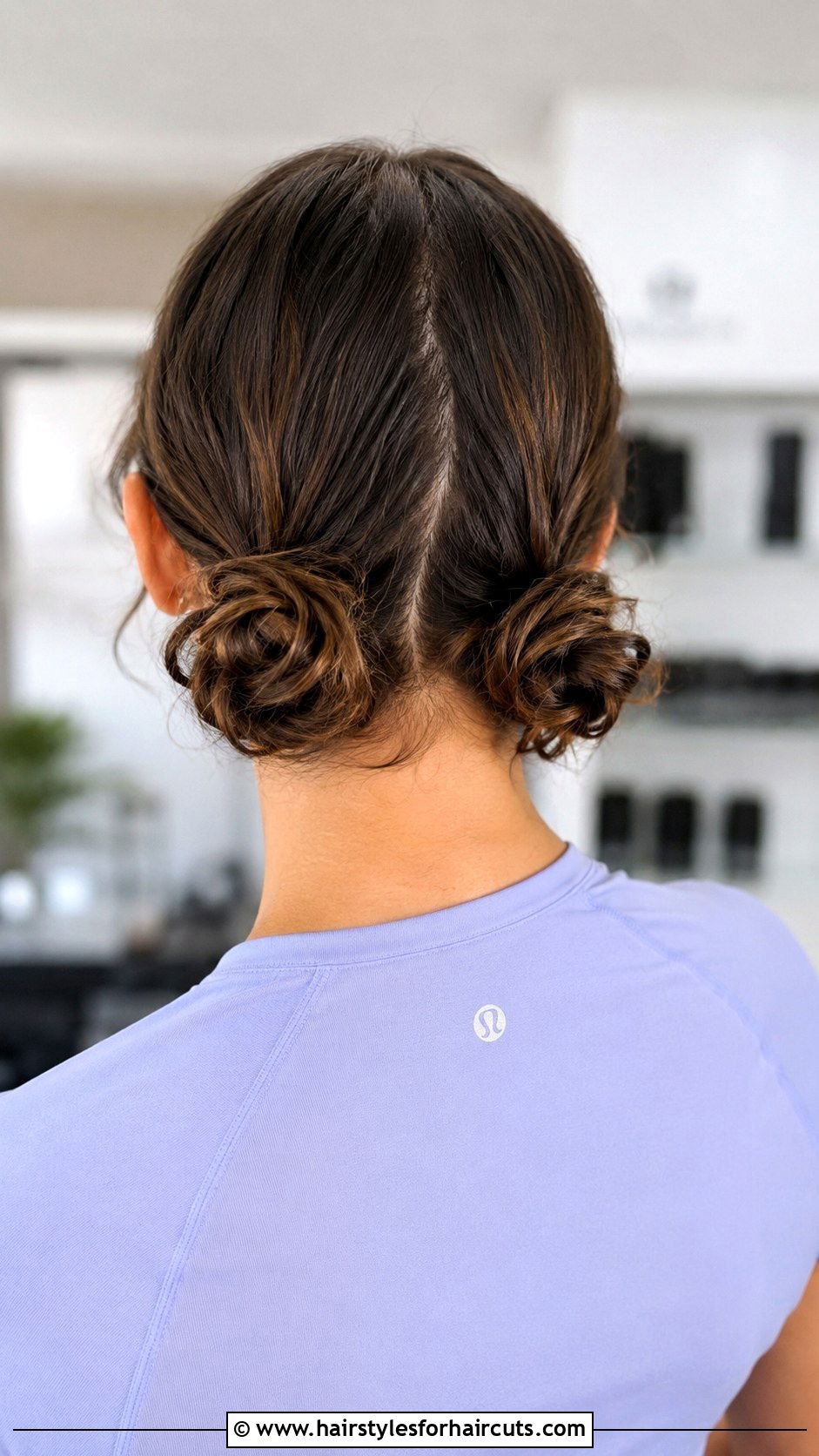 Double Low Curly Buns - 25 gym hairstyles for curly hair - 25 gym hairstyles for curly hair