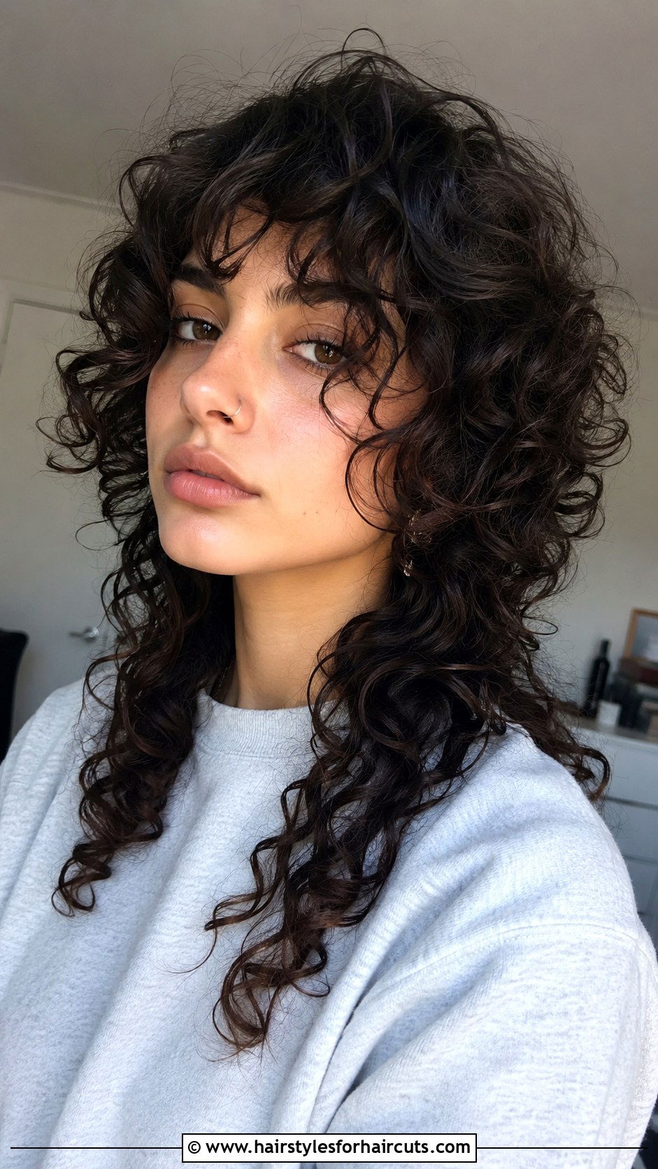 Emo Curls With Face Framing Layers - 25 emo hairstyles for curly hair - 25 emo hairstyles for curly hair