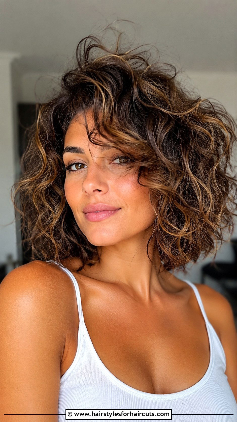 Flipped Over Curly Bob - 25 easy hairstyles for thin curly hair - 25 easy hairstyles for thin curly hair