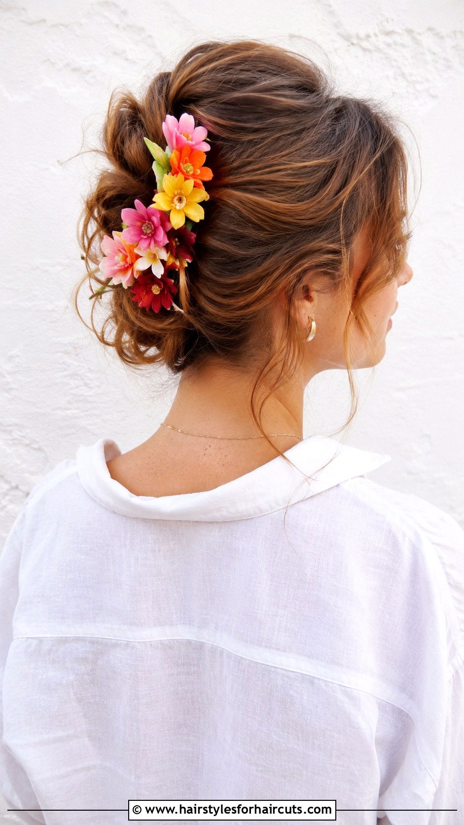 Floral Clip Bouffant - 25 amy winehouse hairstyles - 25 amy winehouse hairstyles