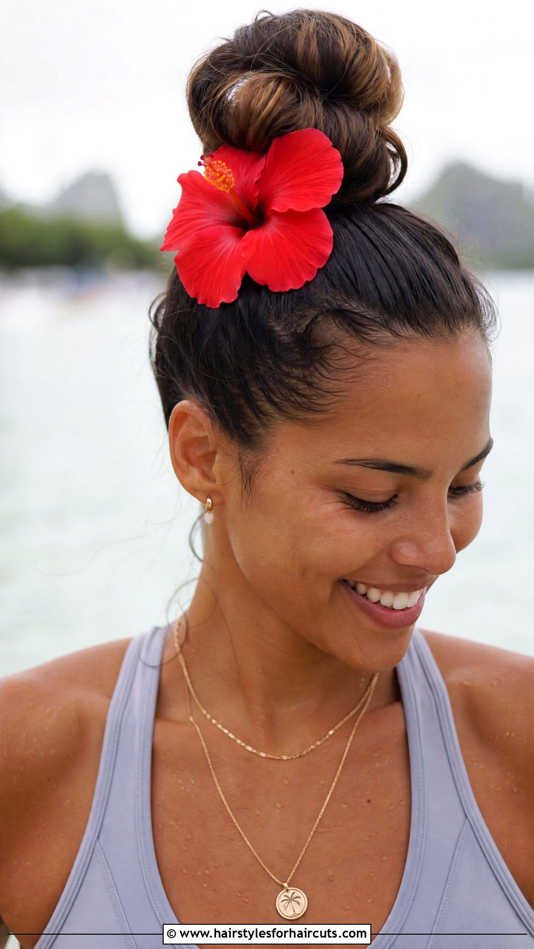 Flower Adorned Top Knot - 25 flower hairstyles - 25 flower hairstyles