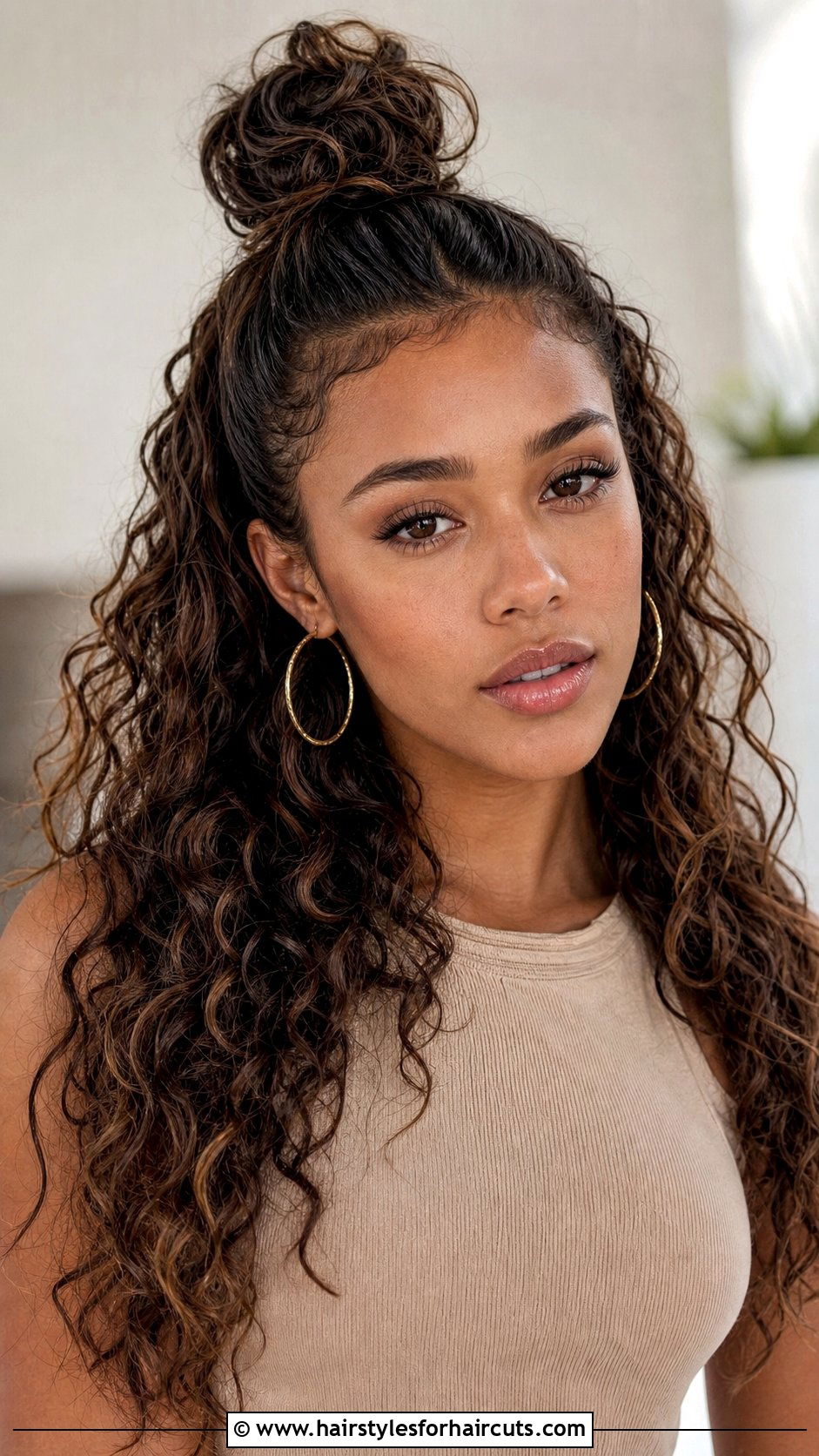 Half Up Curly Top Knot - 25 half up curly hairstyles for long hair - 25 half up curly hairstyles for long hair