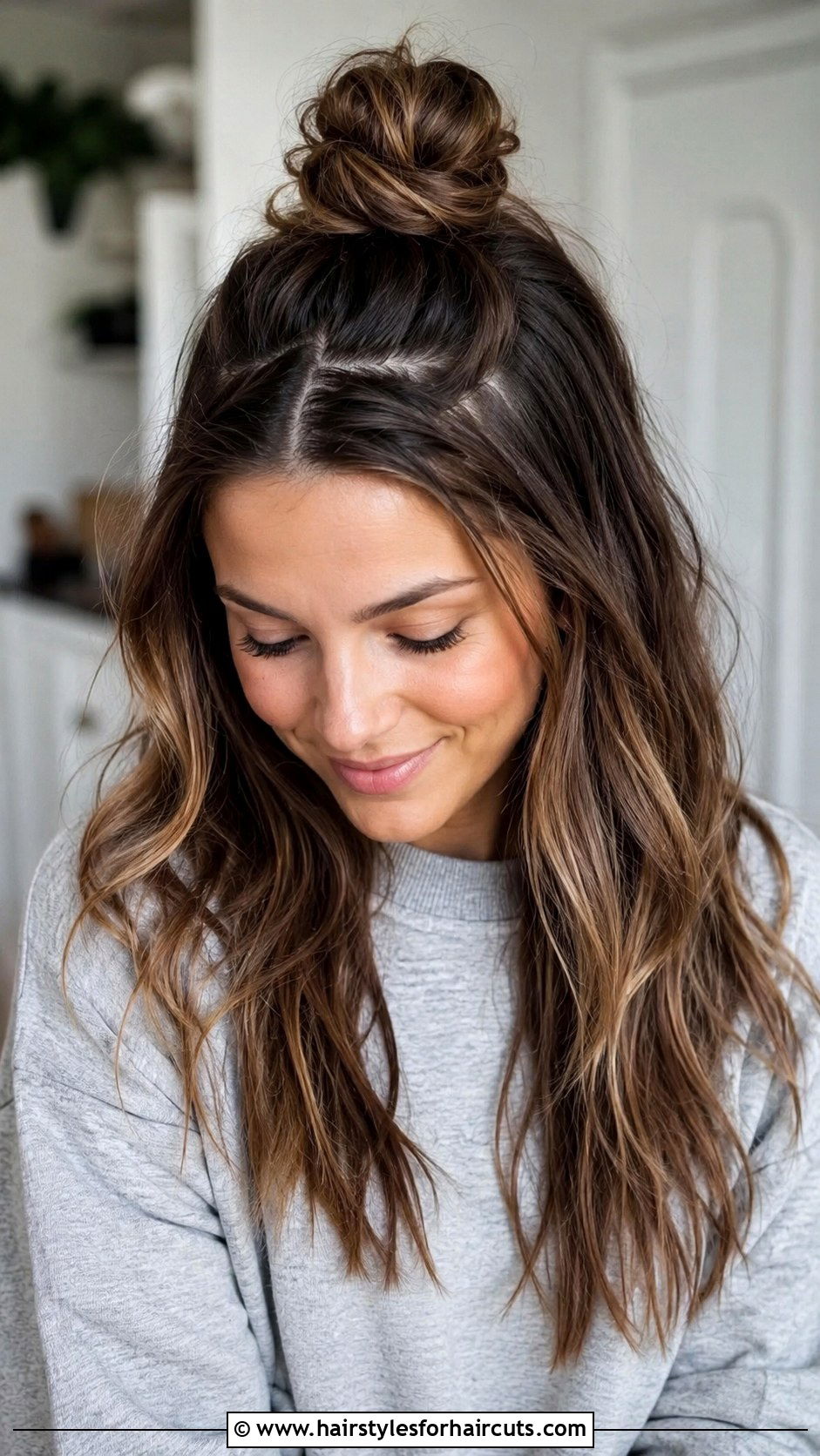 Half Up Top Knot - 25 easy girl hairstyles for long hair - 25 easy girl hairstyles for long hair