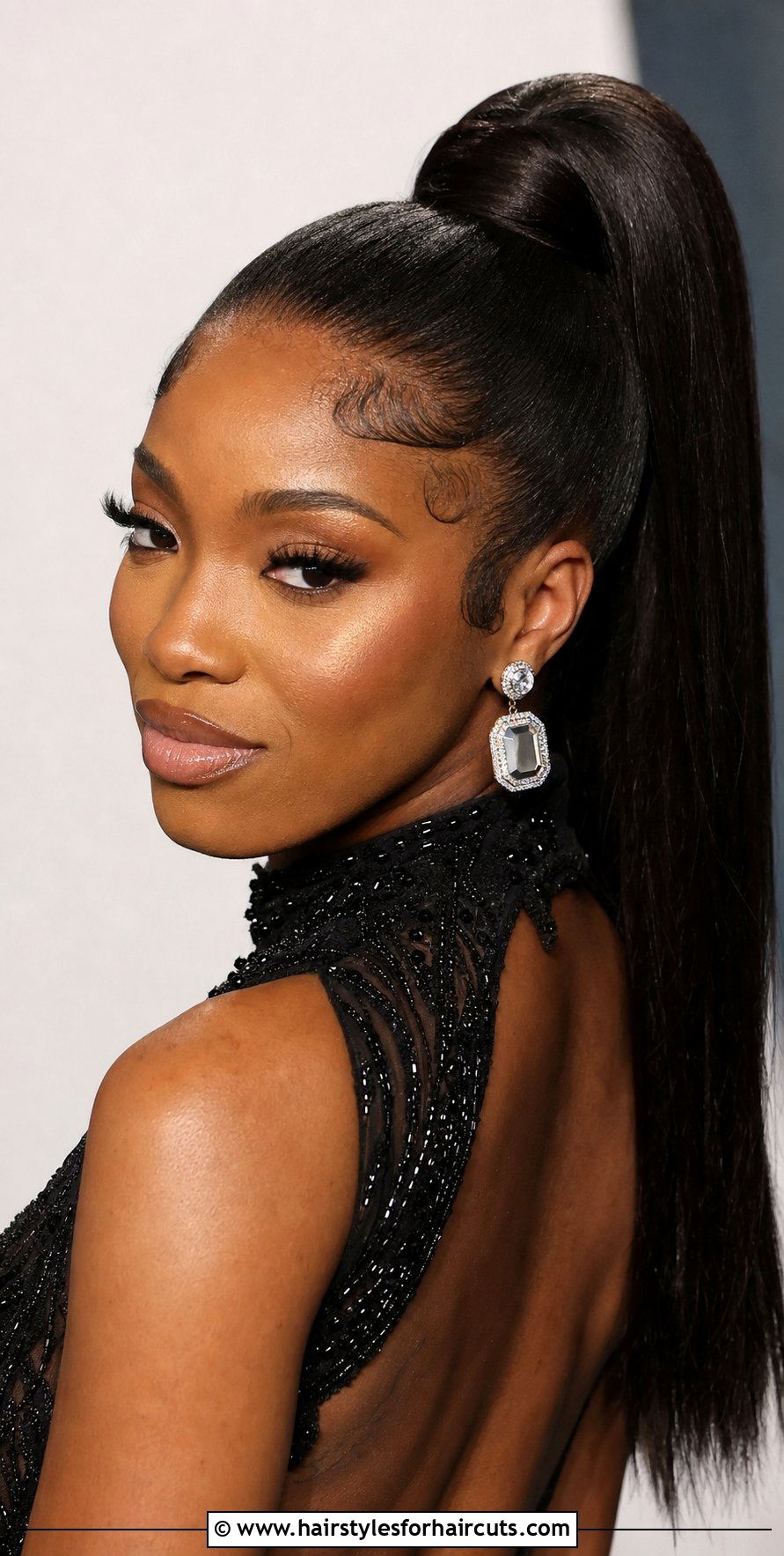 High Ponytail With Sleek Bun Base - 25 high ponytail hairstyles for black hair - 25 high ponytail hairstyles for black hair