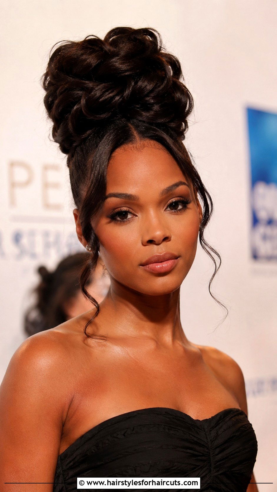 High Roll With Tendrils - 25 pin up hairstyles for black women - 25 pin up hairstyles for black women