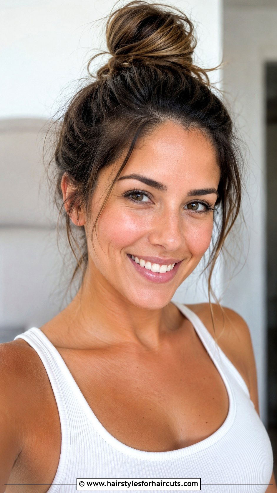 High Top Knot With Flyaways - 25 dance hairstyles - 25 dance hairstyles
