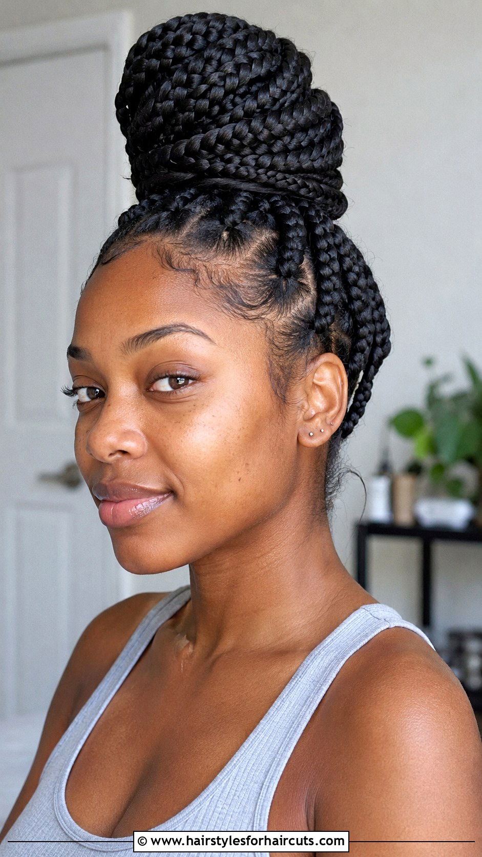 Jumbo Box Braids Bun - 25 braided buns hairstyles for black hair - 25 braided buns hairstyles for black hair