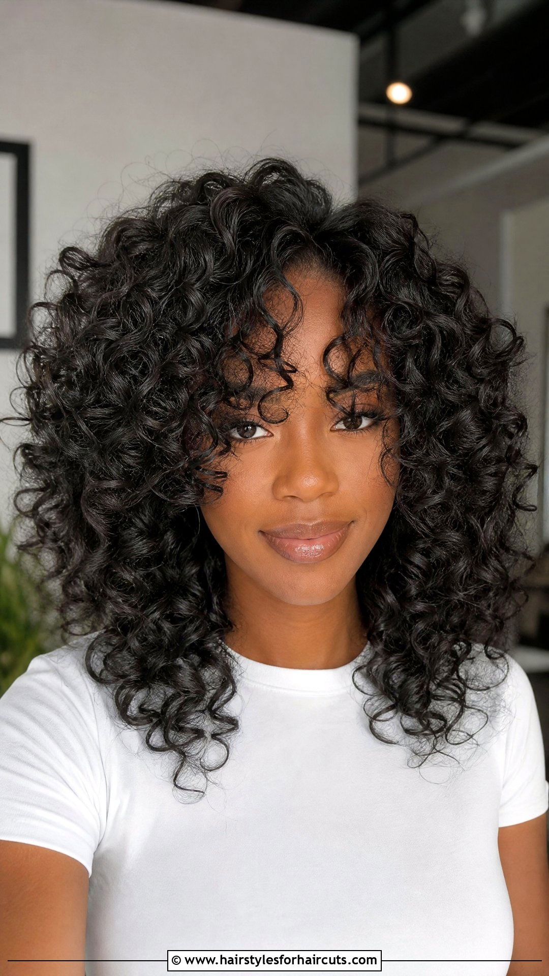 Layered Curly Cut - 25 hairstyles for black girls with thick hair - 25 hairstyles for black girls with thick hair
