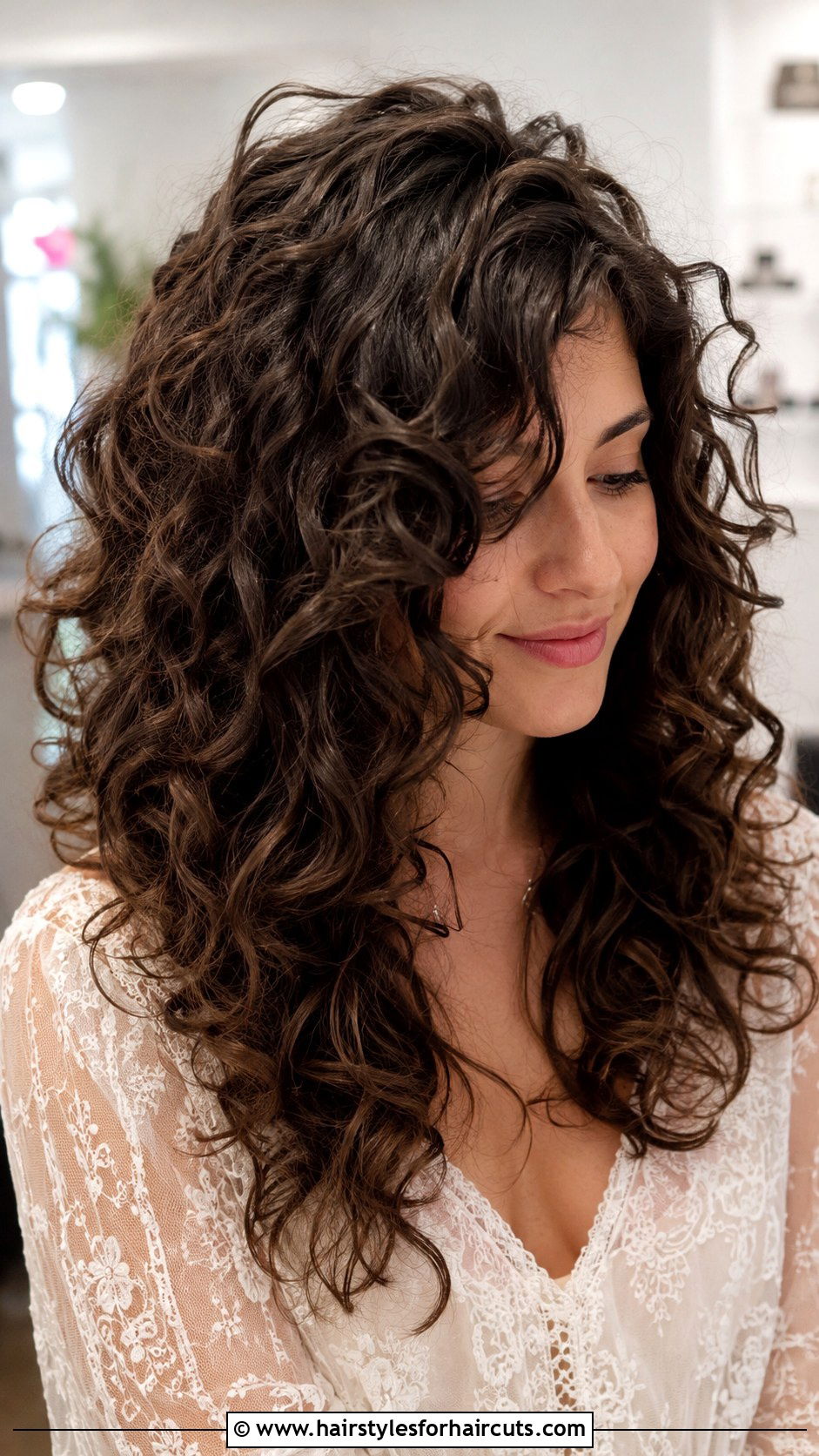 Long Curly Haircut With Face Framing Layers - 25 curly haircuts for round face - 25 curly haircuts for round face