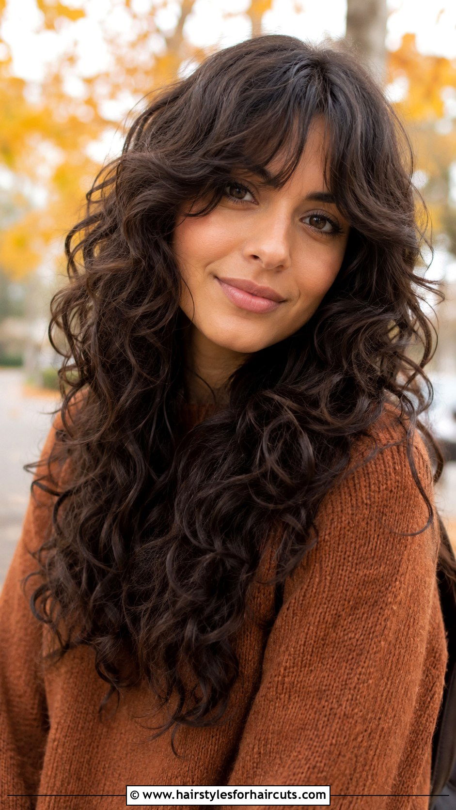 Long Curly Shag With Curtain Bangs - 25 good haircuts for wavy curly hair - 25 good haircuts for wavy curly hair