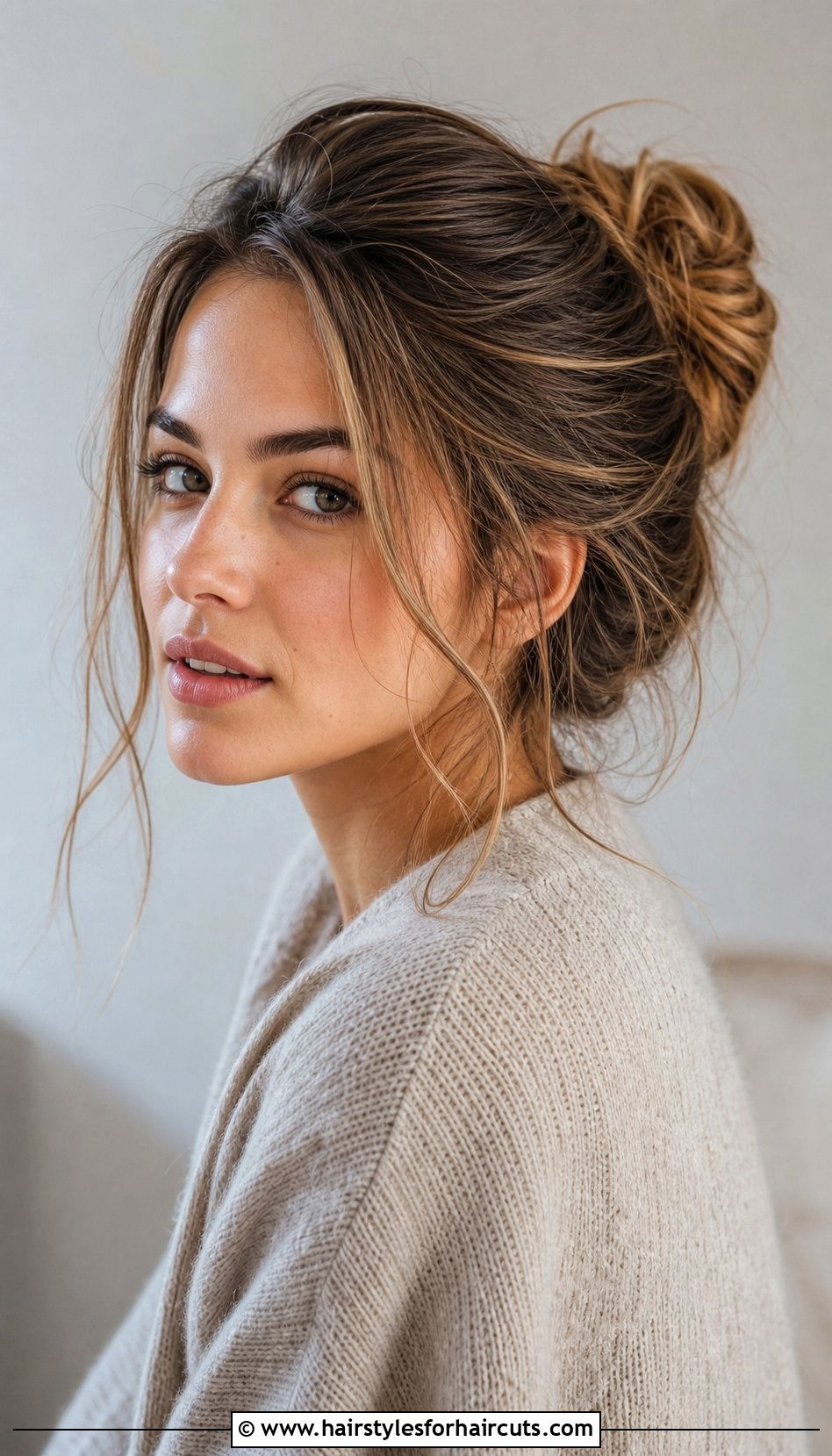 Long Messy Bun With Loose Strands - 25 genderfluid hairstyles for long hair - 25 genderfluid hairstyles for long hair