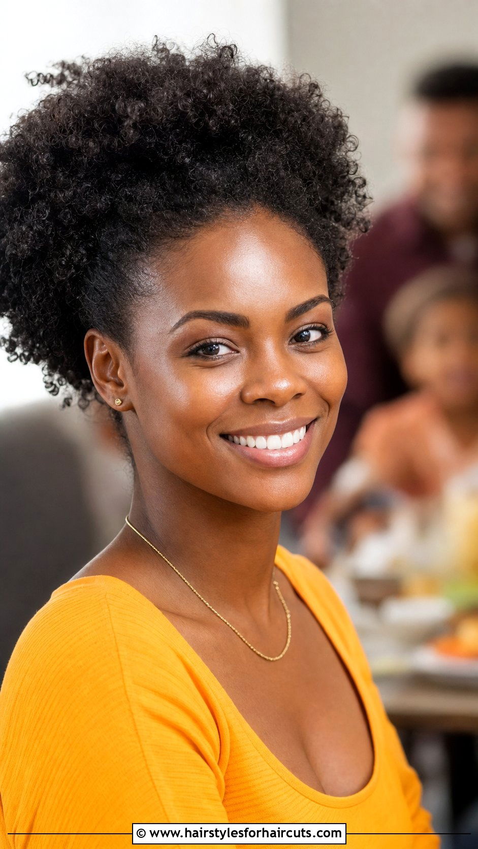 Loose Afro Puff - 25 hairstyles that wont damage hair - 25 hairstyles that won't damage hair