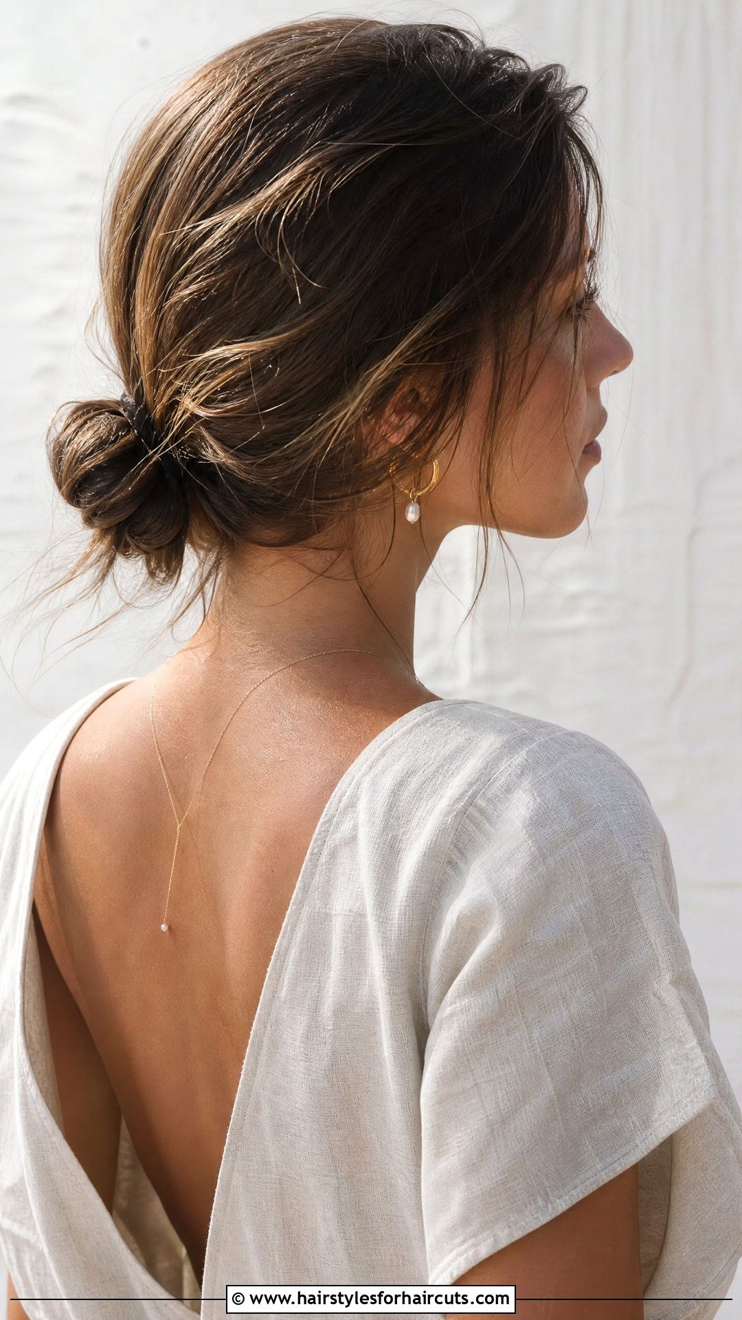 Loose Low Bun With Wispy Ends - 25 wedding hairstyles for short thin hair - 25 wedding hairstyles for short thin hair