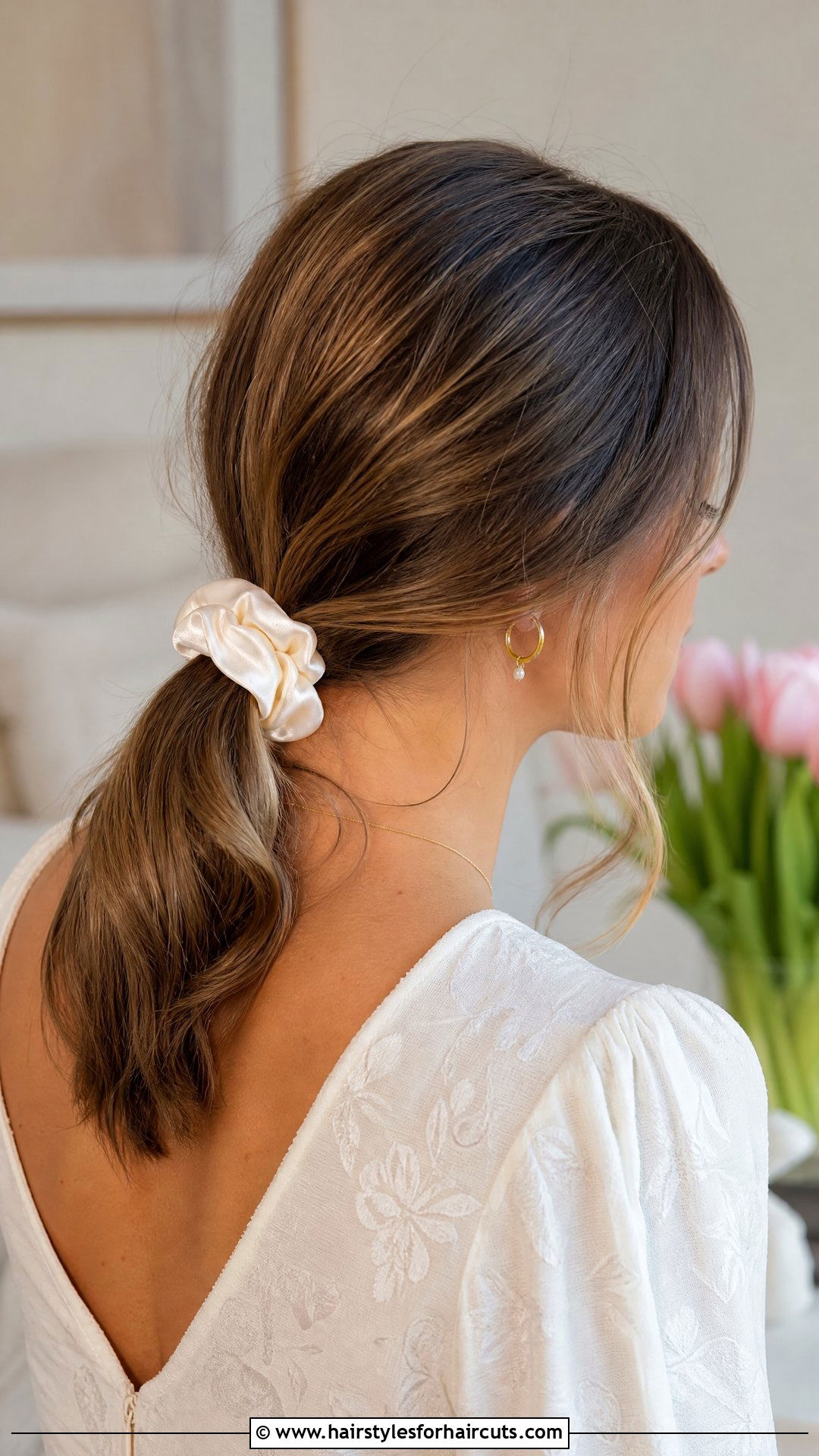 Loose Low Ponytail With Silk Scrunchie - 25 easy hairstyles that wont damage hair - 25 easy hairstyles that won't damage hair