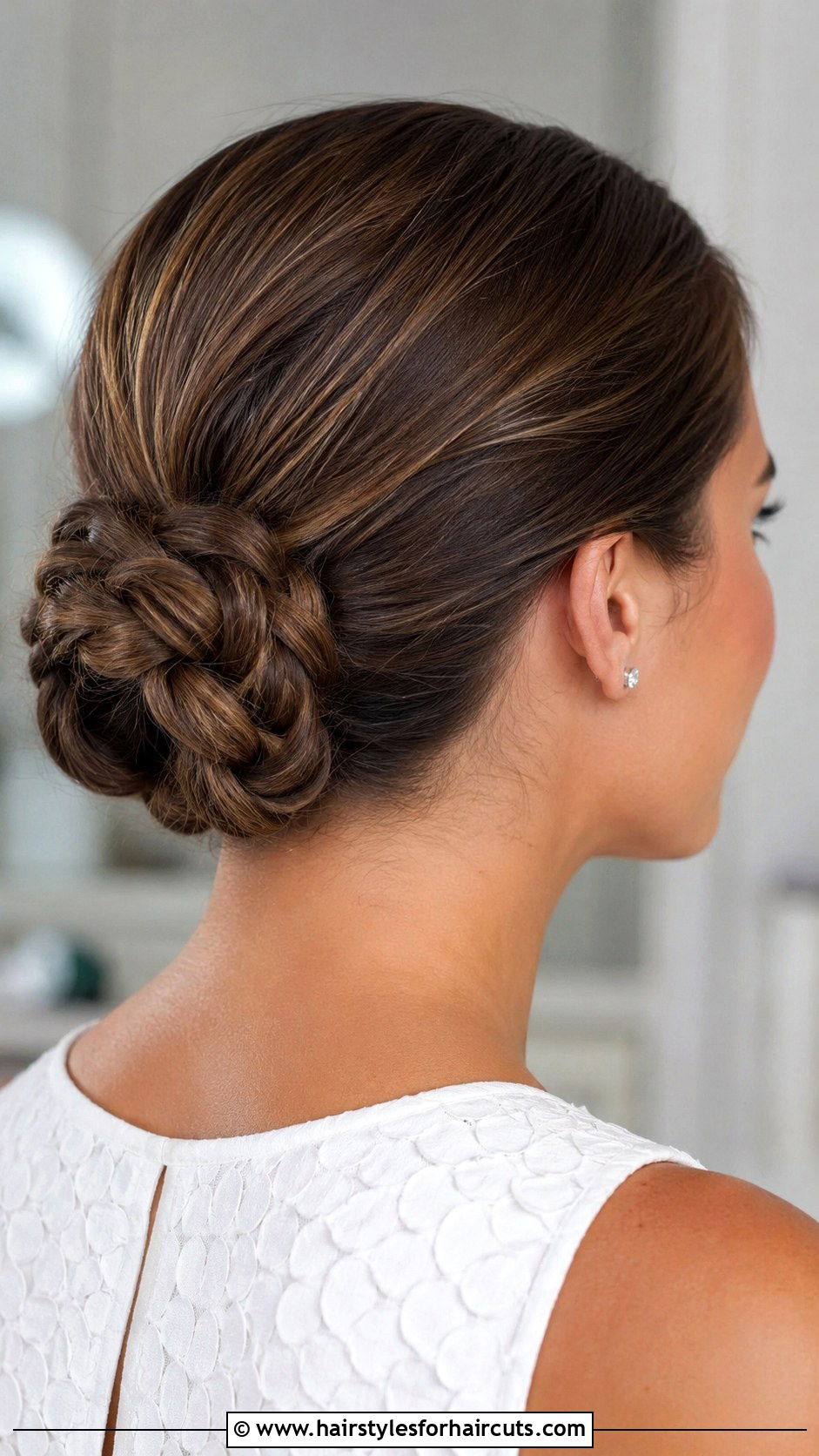Low Braided Bun - 25 cheerleader hairstyles - 25 cheerleader hairstyles