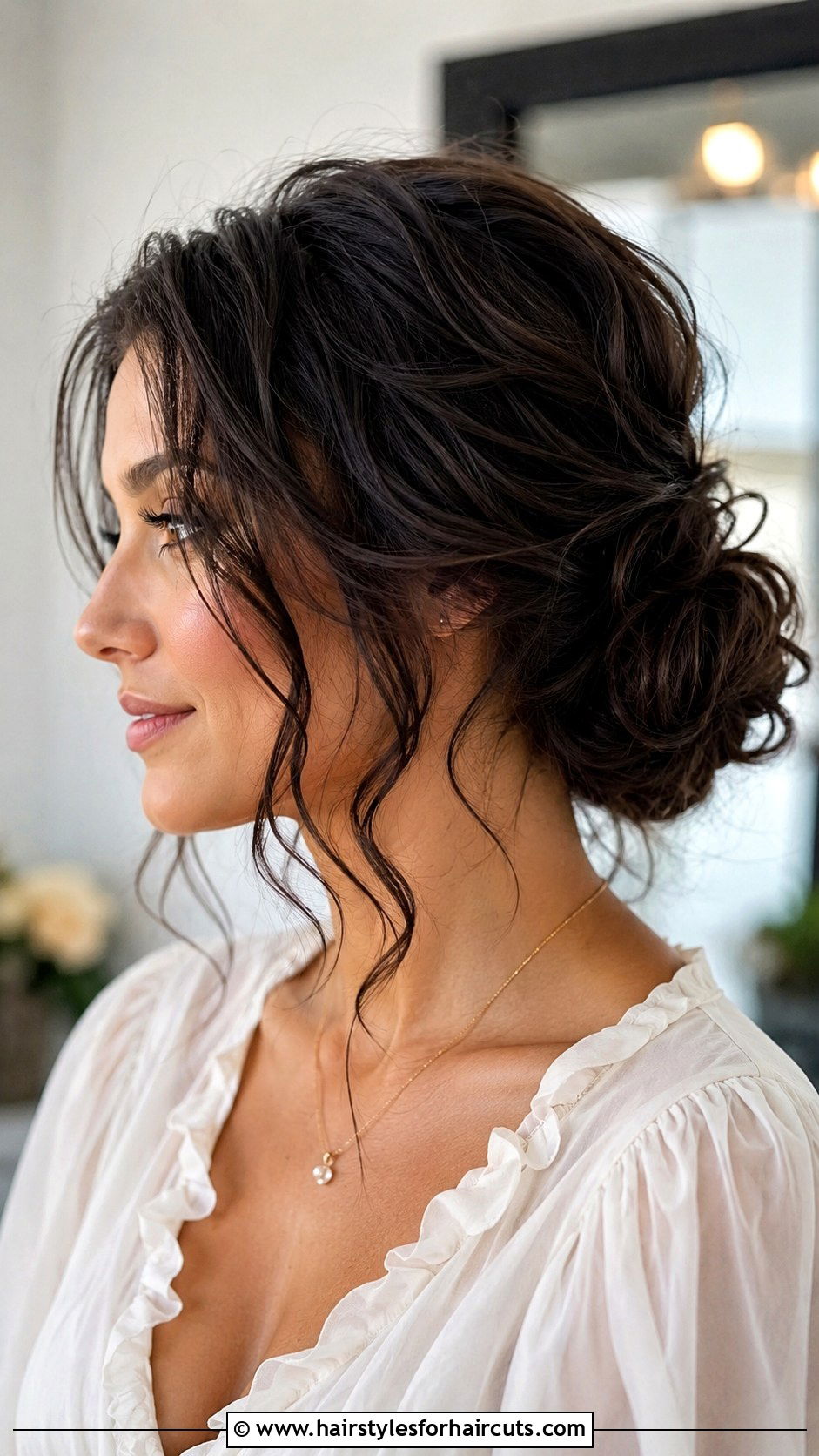 Low Bun With Loose Coils - 25 coil hairstyles for natural hair - 25 coil hairstyles for natural hair