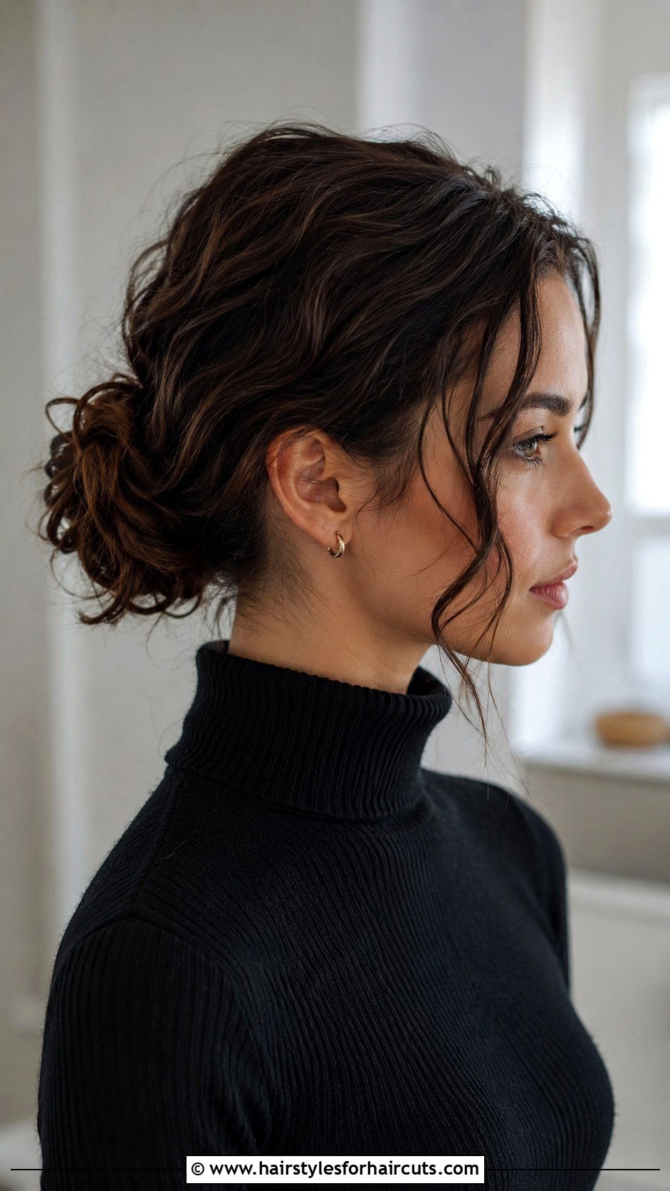 Low Curly Bun - 25 business casual hairstyles for curly hair - 25 business casual hairstyles for curly hair