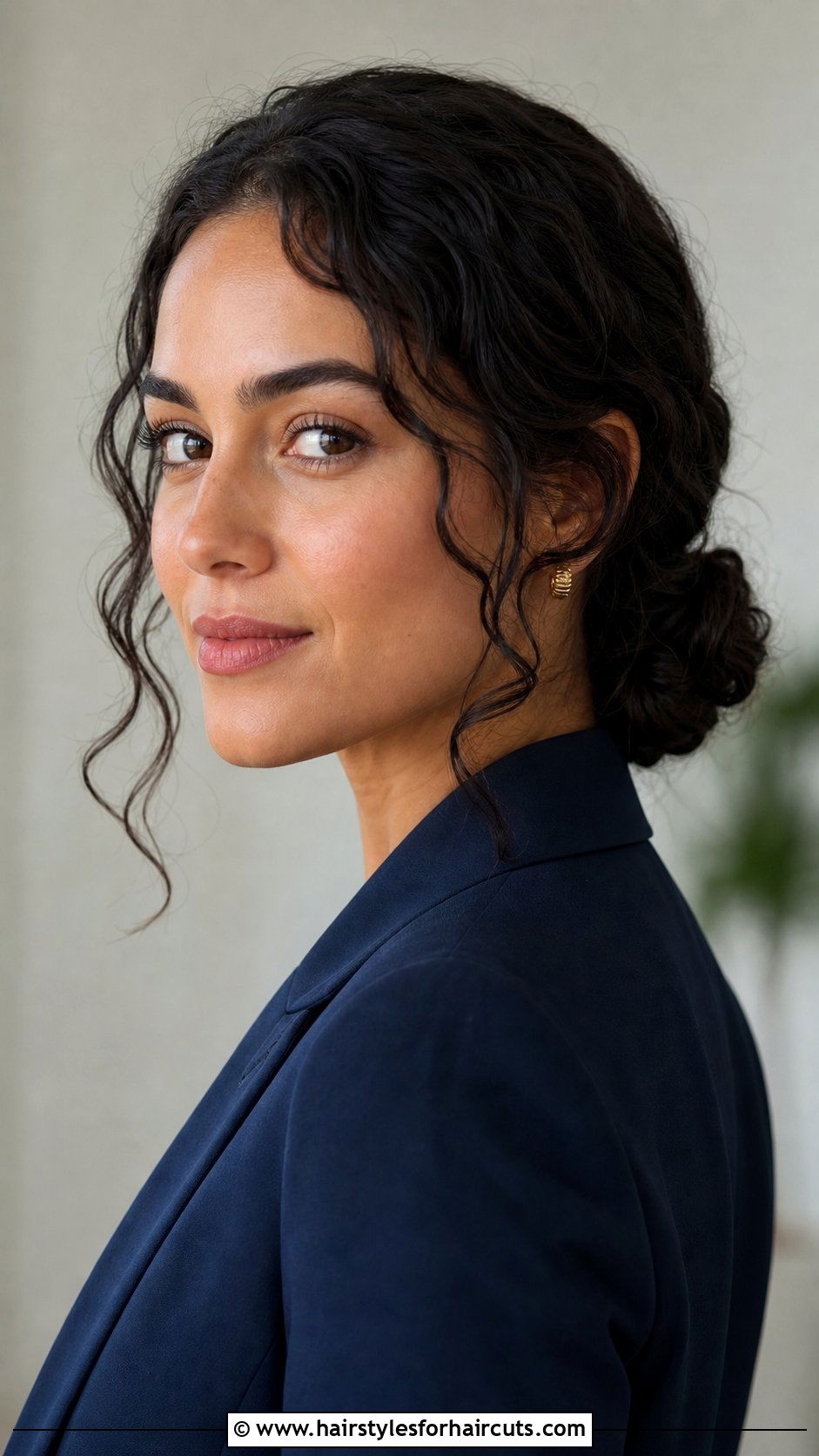 Low Curly Bun - 25 interview hairstyles for curly hair - 25 interview hairstyles for curly hair
