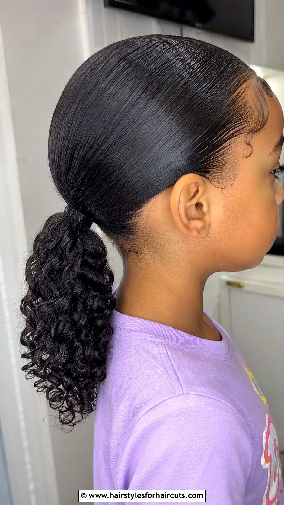 Low Curly Ponytail - 25 cute hairstyles curly hair kids - 25 cute hairstyles curly hair kids
