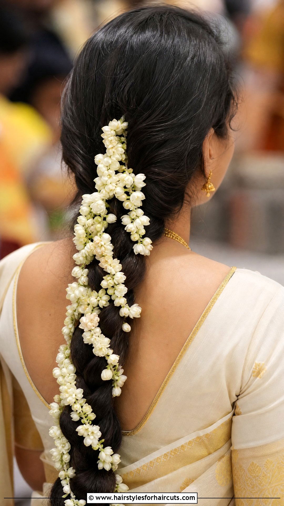 Low Loose Braid With Fresh Jasmine - 25 wedding hairstyles for saree - 25 wedding hairstyles for saree