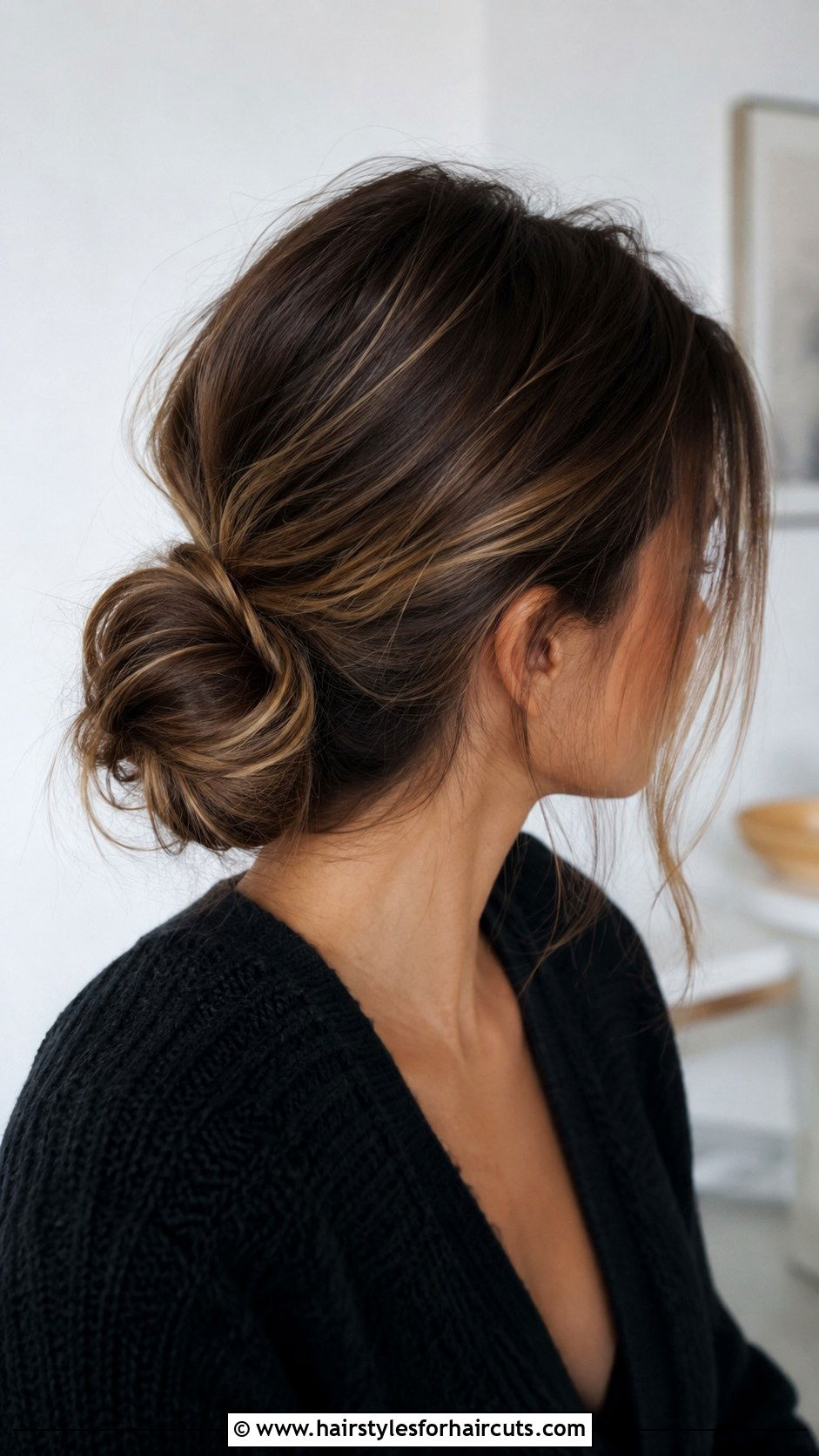 Low Messy Bun - 25 easy funeral hairstyles for long hair - 25 easy funeral hairstyles for long hair