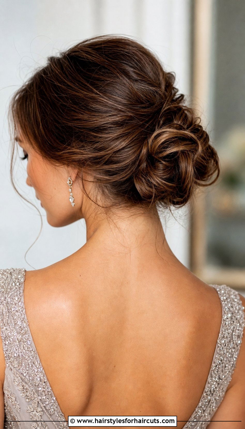 Low Messy Bun - 25 hairstyles for frizzy hair - 25 hairstyles for frizzy hair