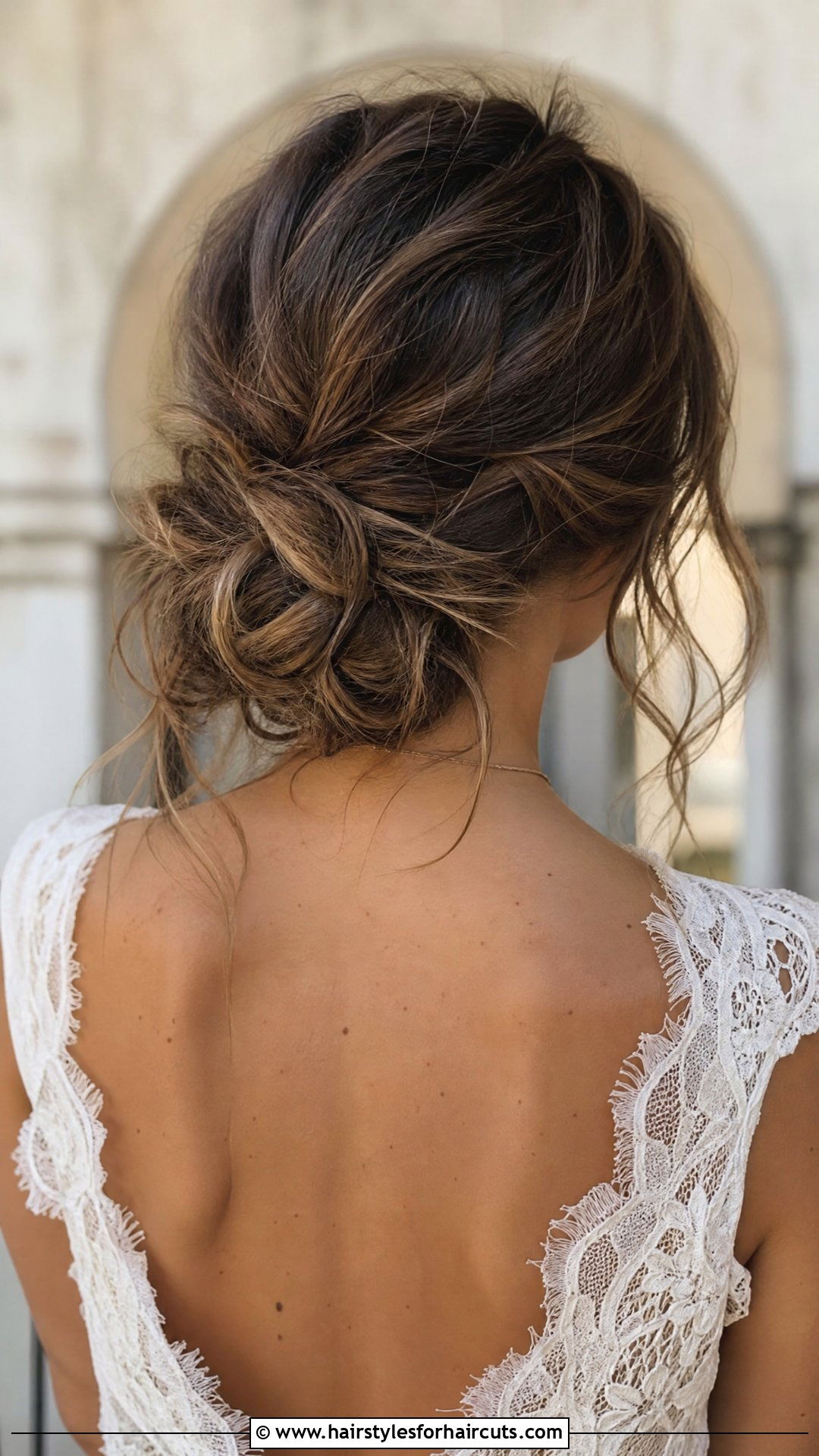 Low Messy Wavy Bun - 25 wedding hairstyles for wavy hair - 25 wedding hairstyles for wavy hair