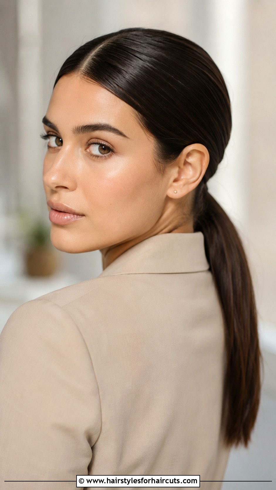 Low Ponytail With Center Part - 25 graduation hairstyles for straight hair - 25 graduation hairstyles for straight hair