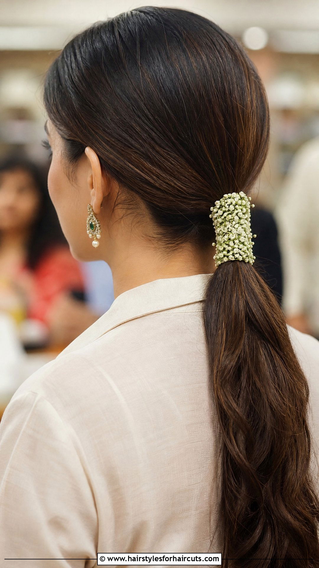 Low Ponytail With Floral Wrap - 25 flower hairstyles - 25 flower hairstyles