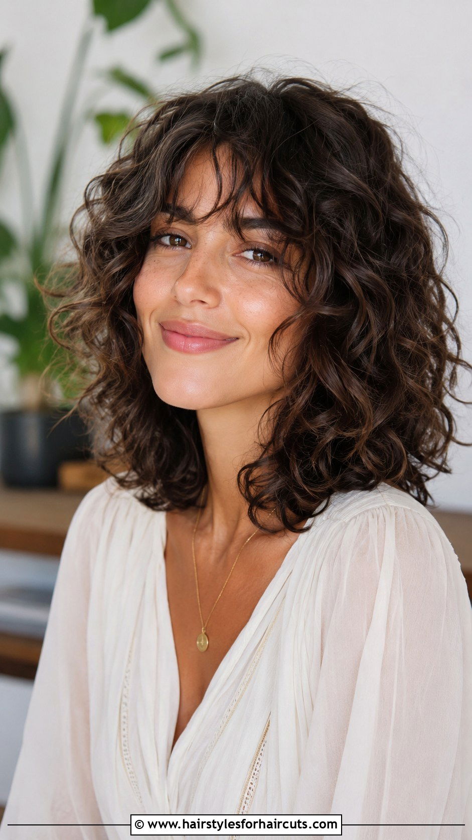 Medium Curly Cut With Curtain Bangs - 25 haircuts for women with thick curly hair - 25 haircuts for women with thick curly hair