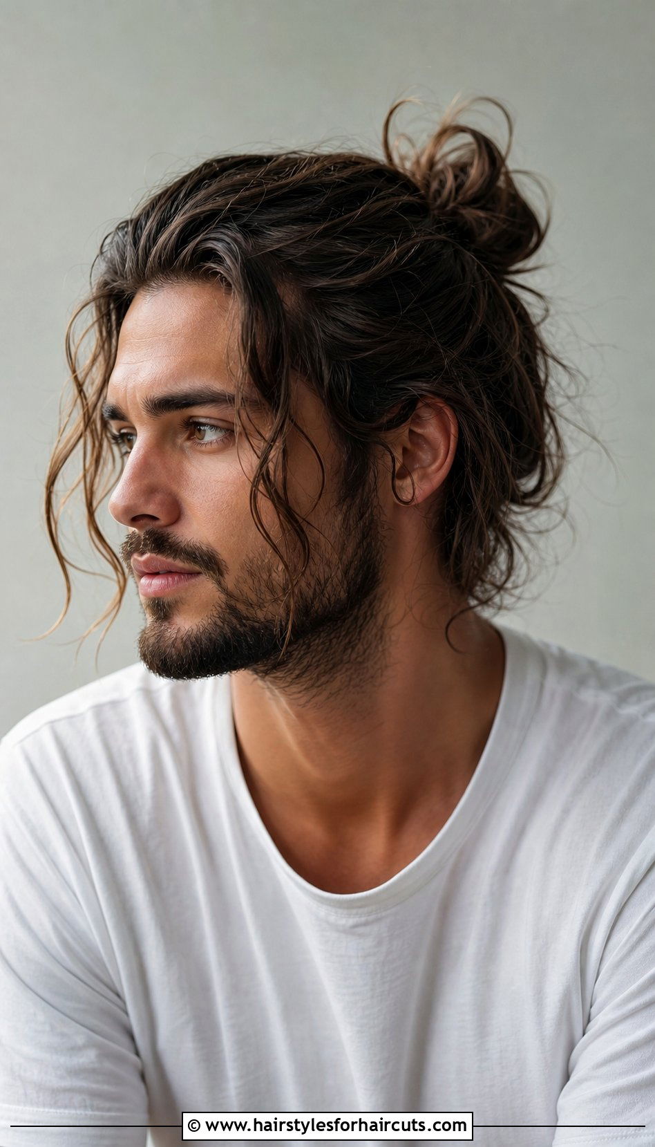 Messy Bun With Loose Strands - 25 long hair stud haircuts - 25 long hair stud haircuts