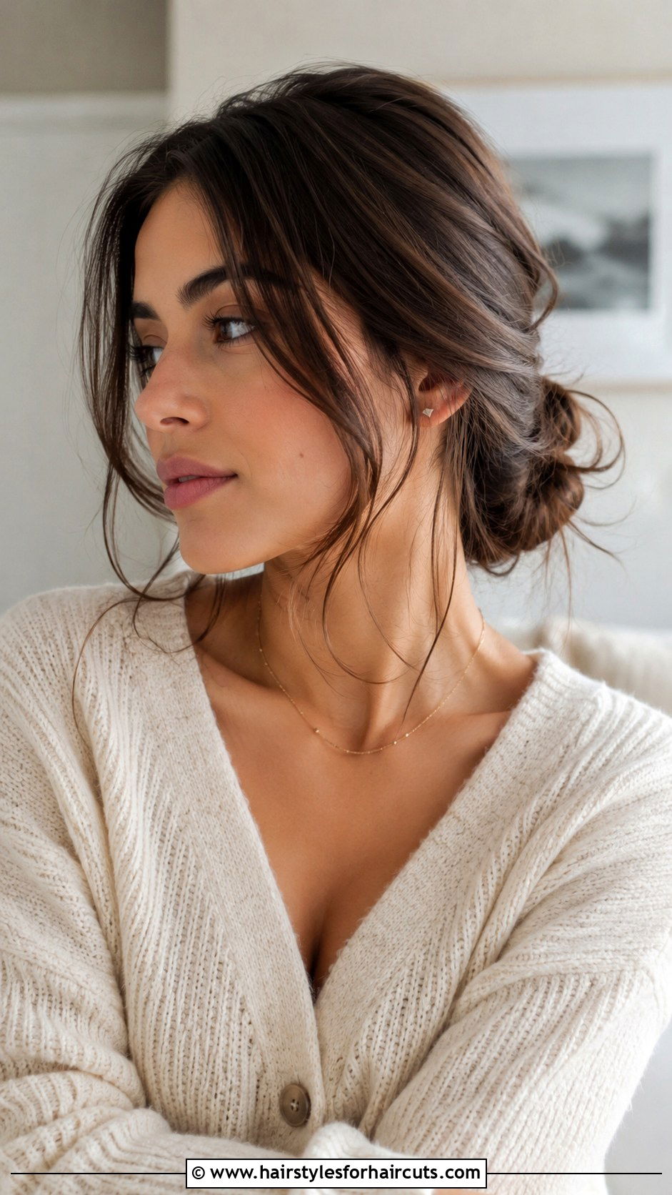 Messy Low Bun With Face Framing Pieces - 25 bun hairstyles for relaxed hair - 25 bun hairstyles for relaxed hair