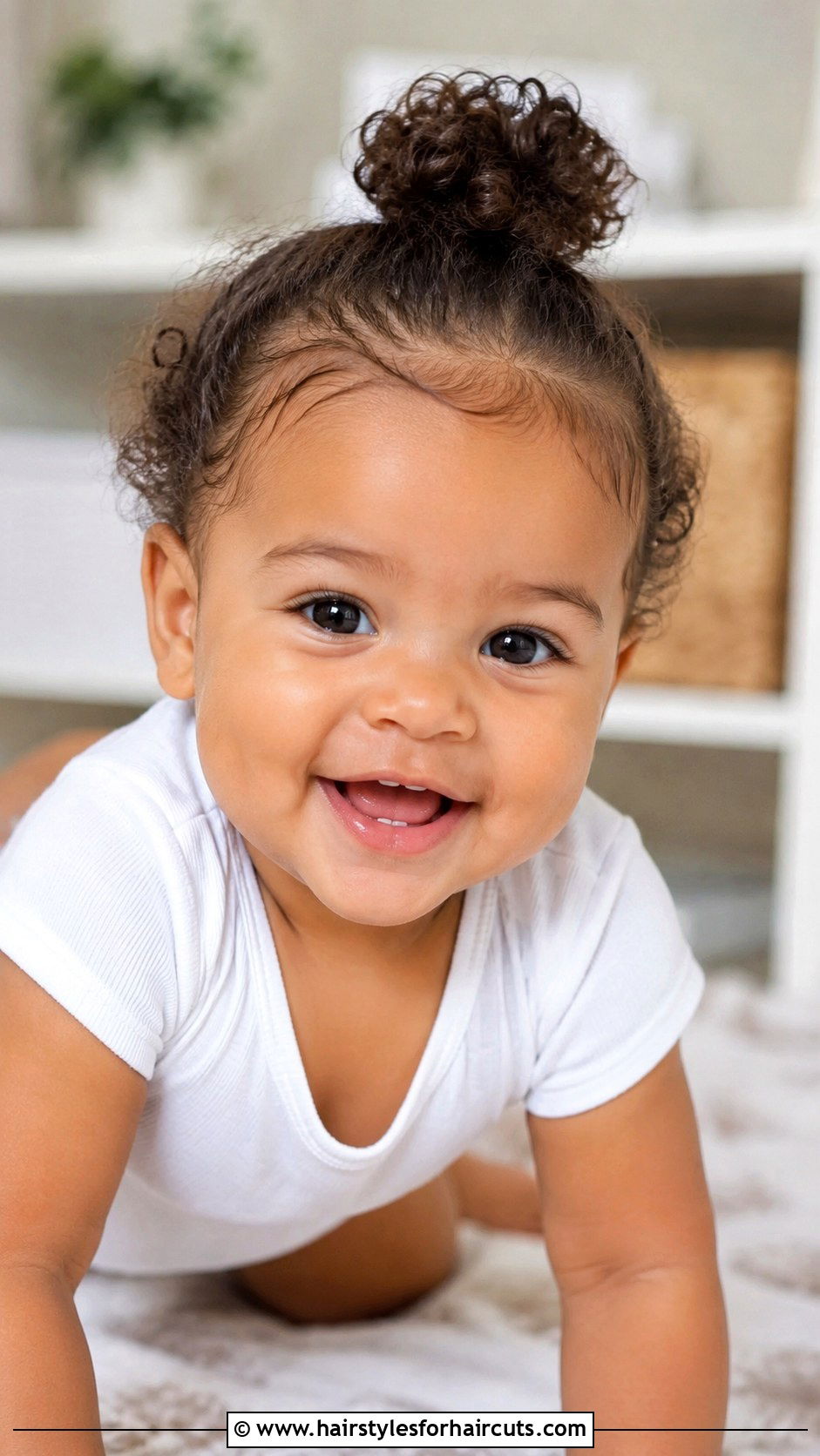 Mini Curly Top Knot - 25 curly baby hairstyles - 25 curly baby hairstyles