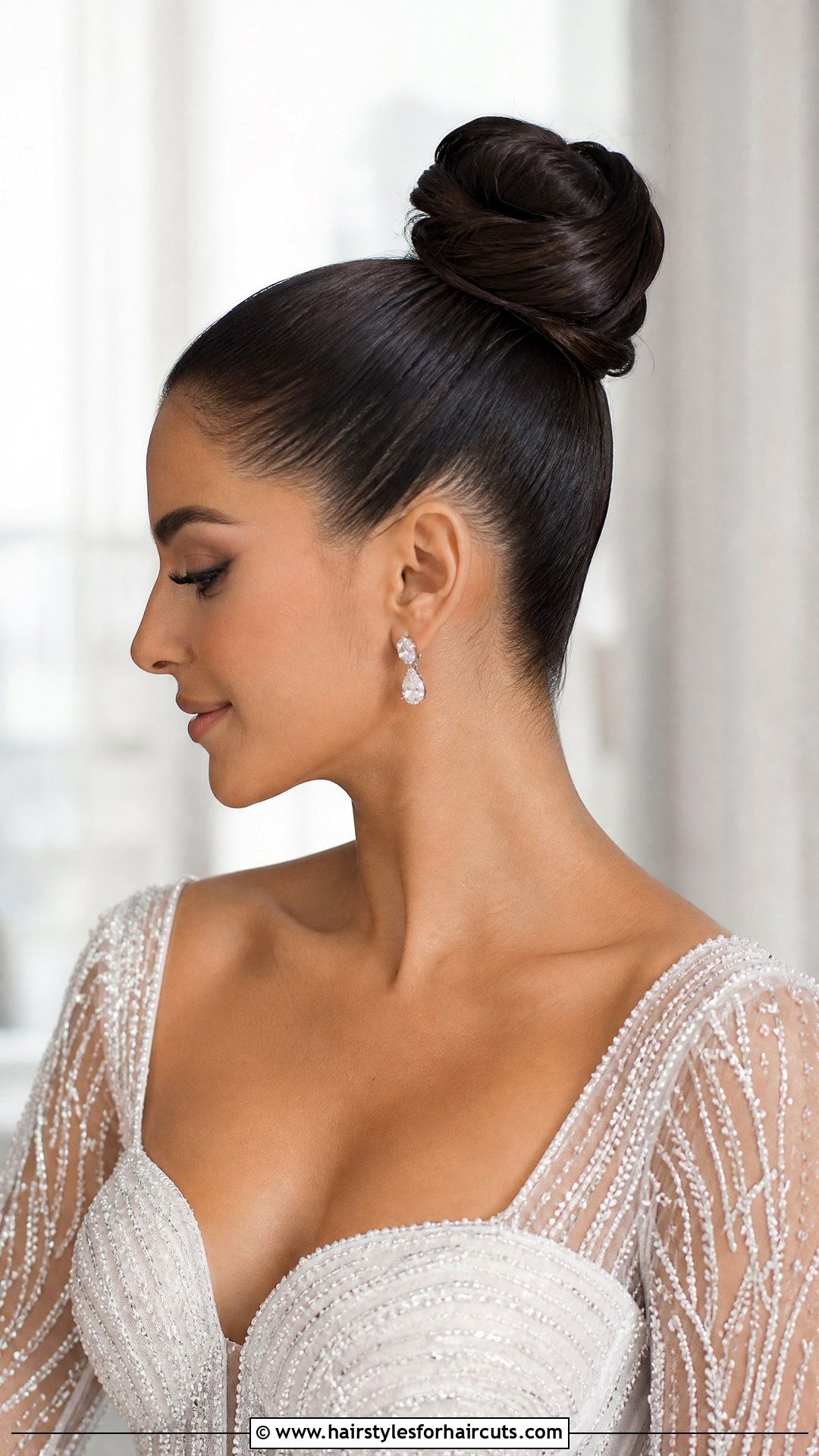Modern Sleek Top Knot Bridal - 25 wedding hairstyles for dark hair - 25 wedding hairstyles for dark hair