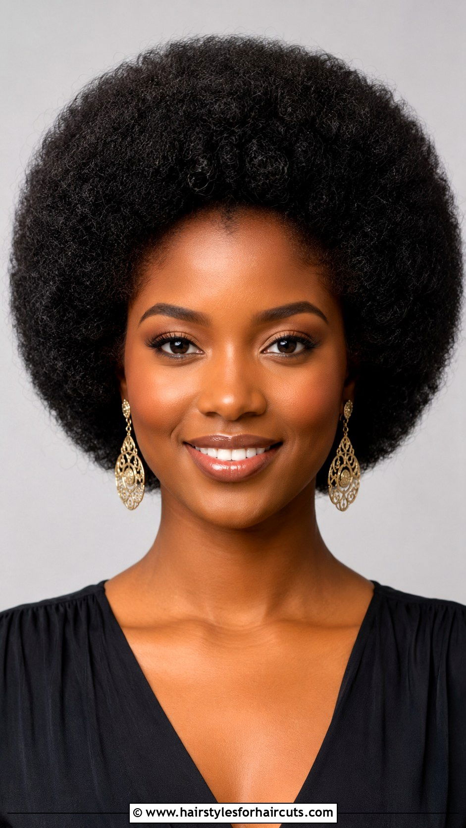 Rounded Afro - 25 80s hairstyles - 25 80s hairstyles