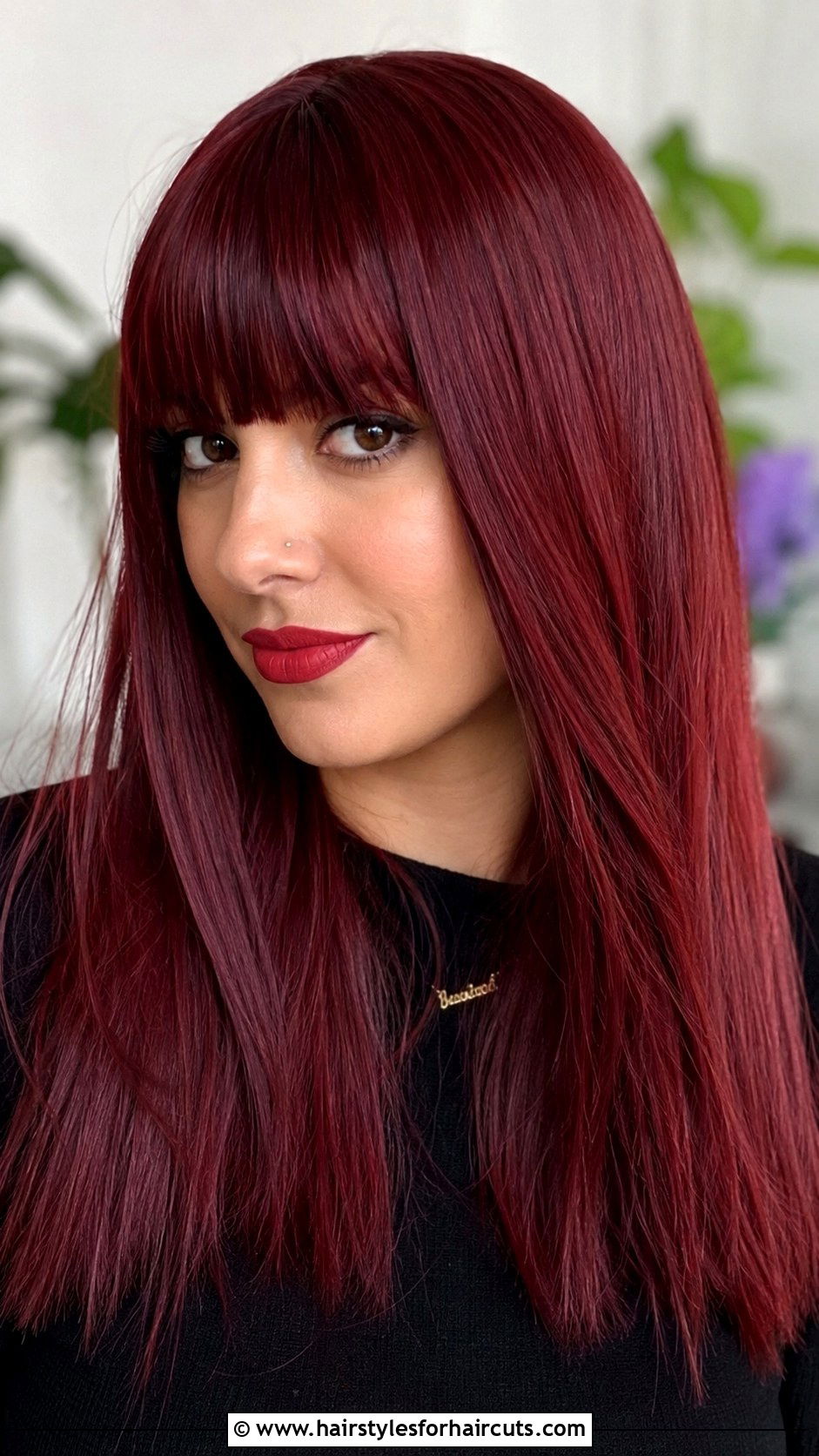 Ruby Dark Red Hair with Bangs - 25 dark red hairstyles - 25 dark red hairstyles