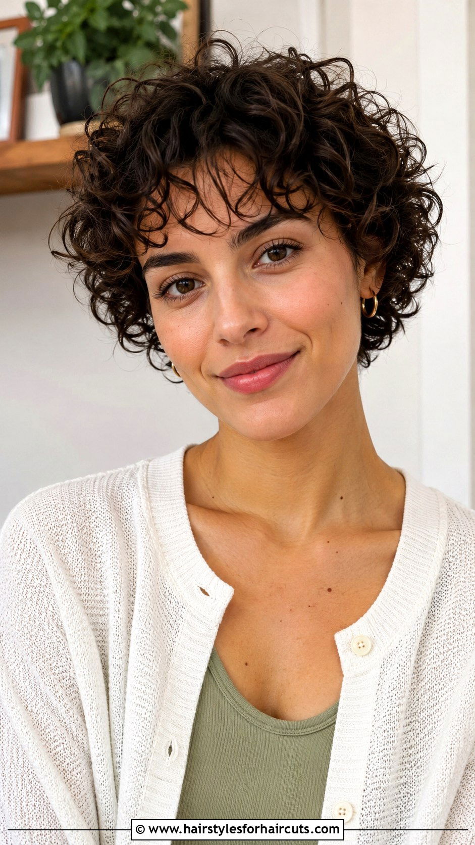 Short Curly Cut With Wispy Bangs - 25 bang haircuts for curly hair - 25 bang haircuts for curly hair