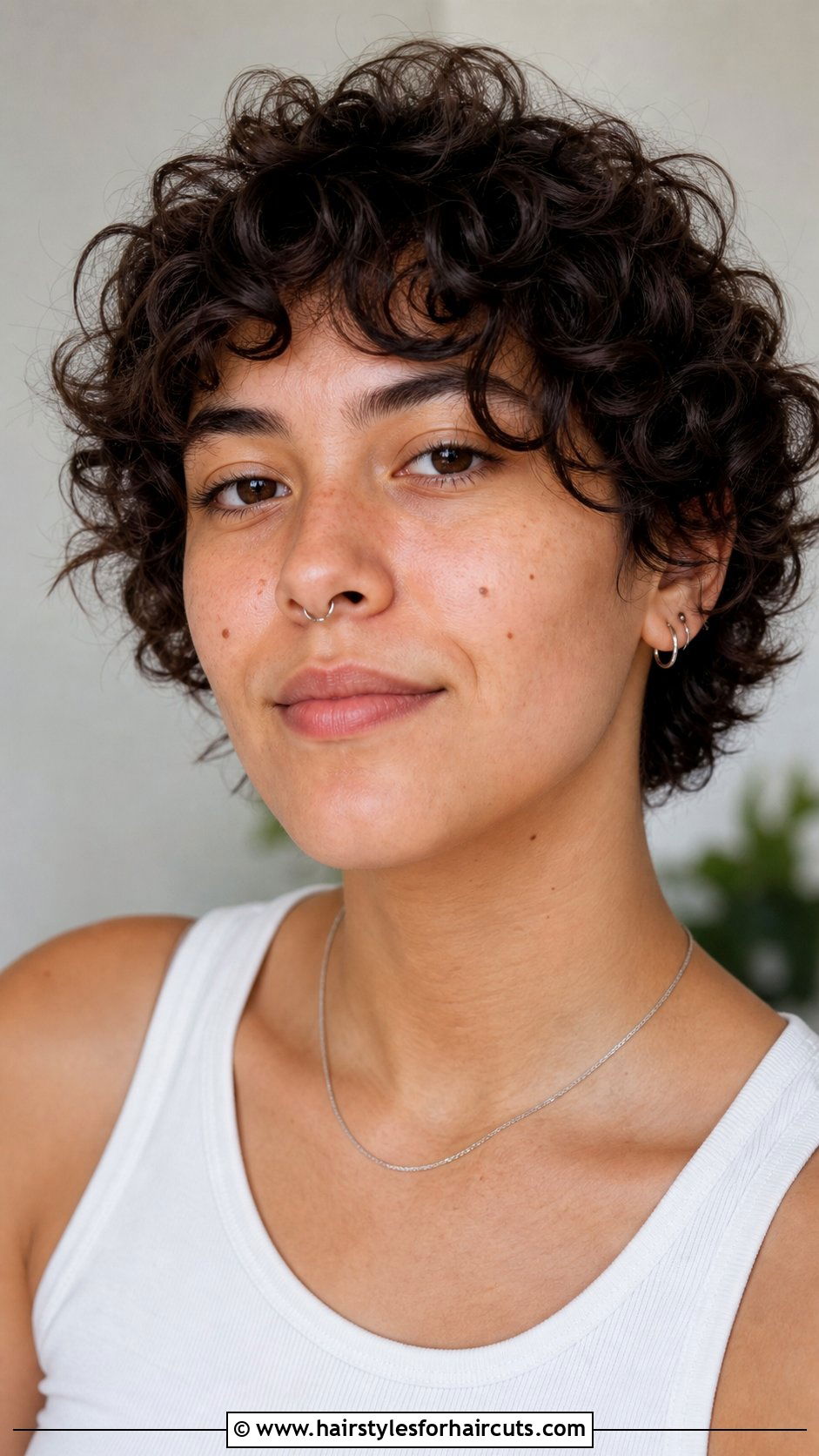 Short Curly Layered Cut - 25 gender neutral haircuts for curly hair - 25 gender neutral haircuts for curly hair