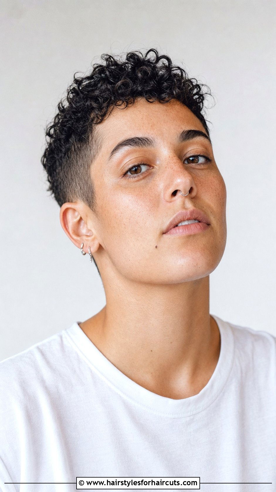 Short Curly Pixie Cut - 25 gender neutral haircuts for curly hair - 25 gender neutral haircuts for curly hair